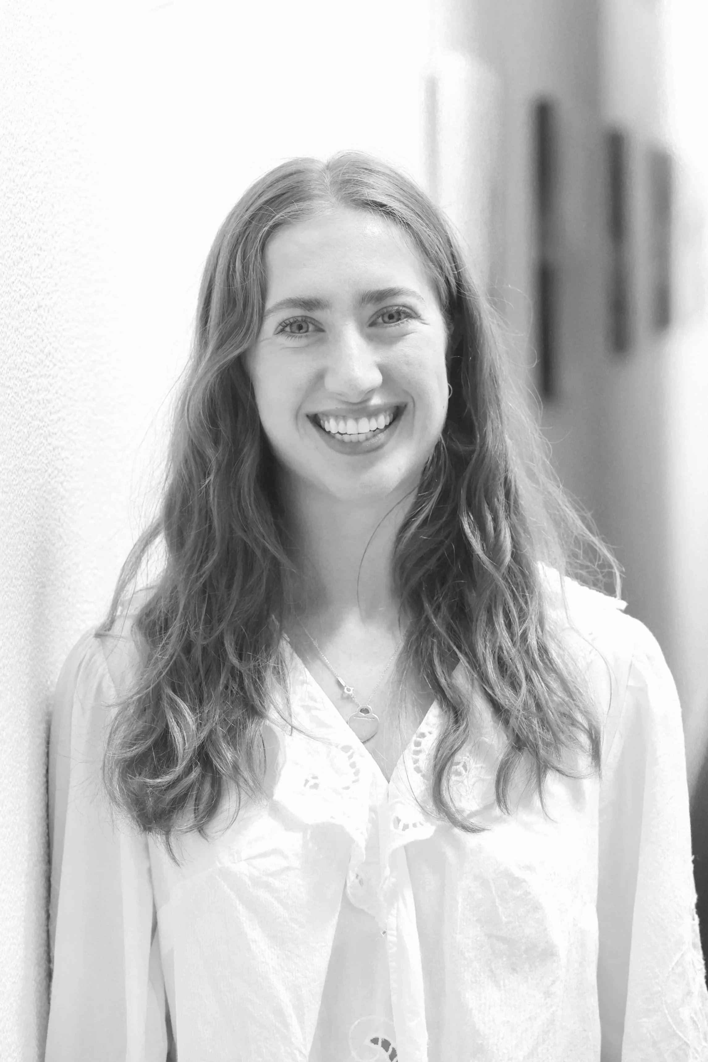 A professional headshot of Dr Alice Bain, a chiropractor in Hastings.