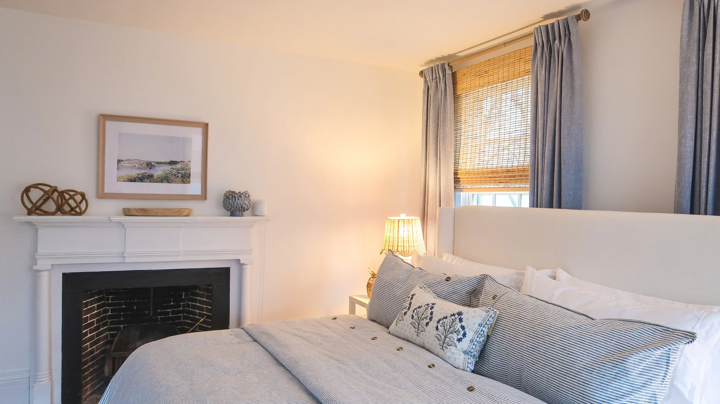 Coastal bedroom interior design with neutral palette by SPACE. Design