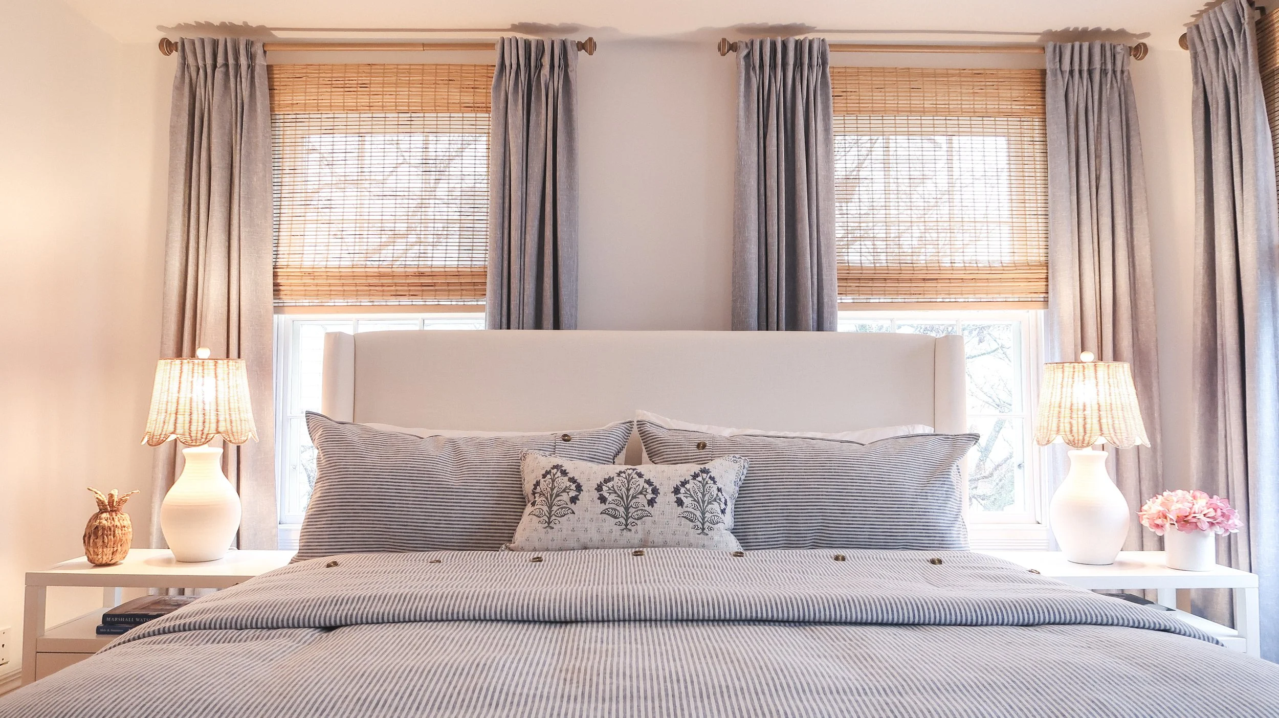 Coastal bedroom interior design with neutral palette by SPACE. Design