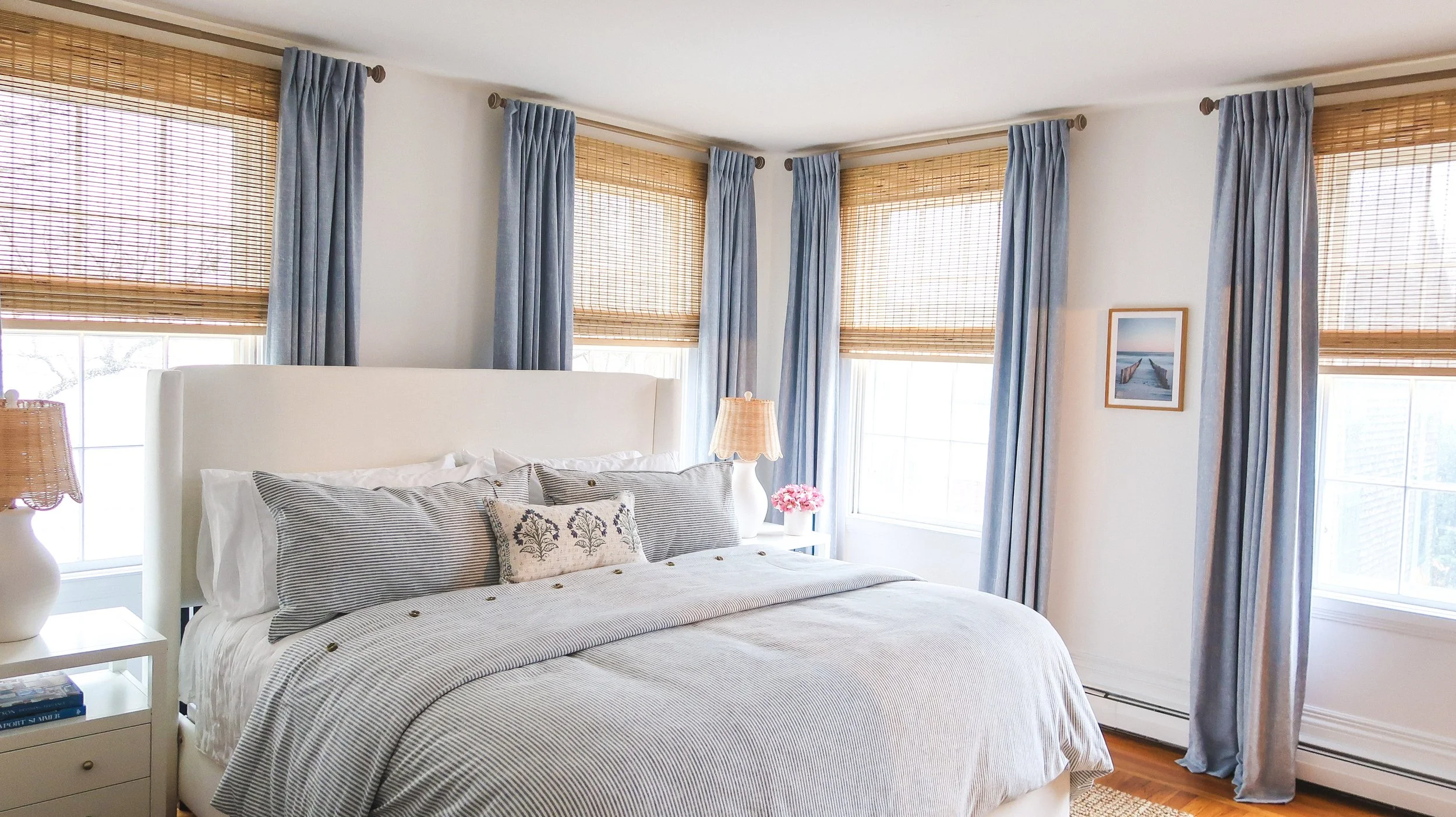 Coastal bedroom interior design with neutral palette by SPACE. Design