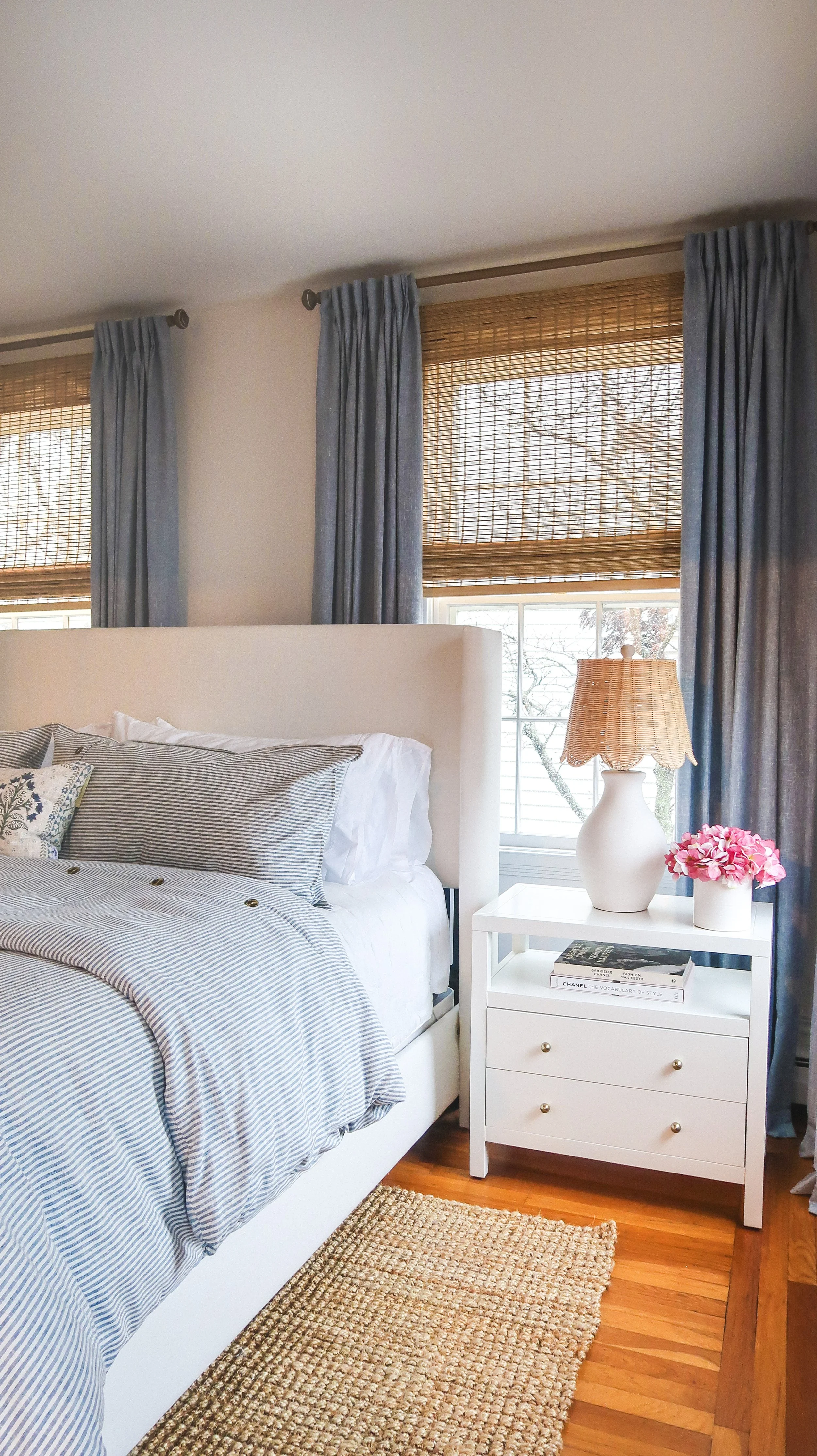 Coastal bedroom interior design with neutral palette by SPACE. Design