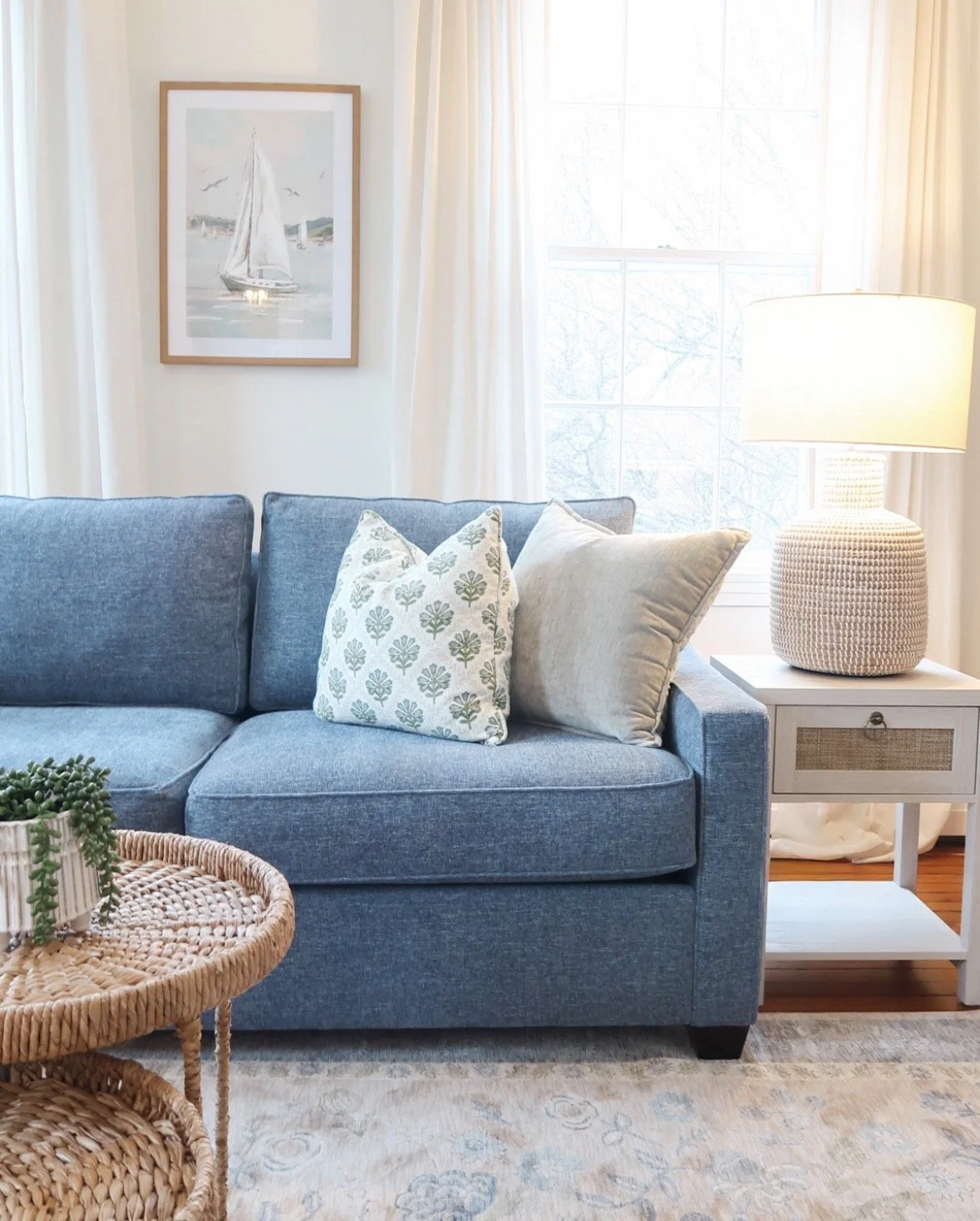 Coastal living room interior design with neutral palette by SPACE. Design