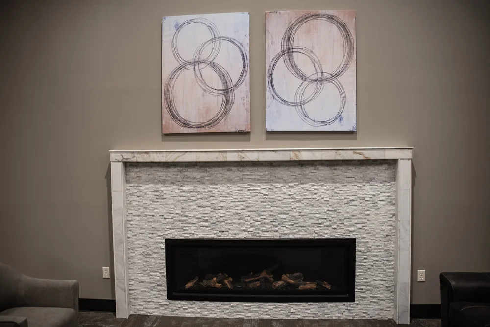 The gas fireplace and lounge seating on the Mezzanine at Tower Event and Conference Center in Marietta, Ohio