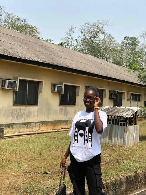 Female Twayne Safe Haven member wearing TSH shirt