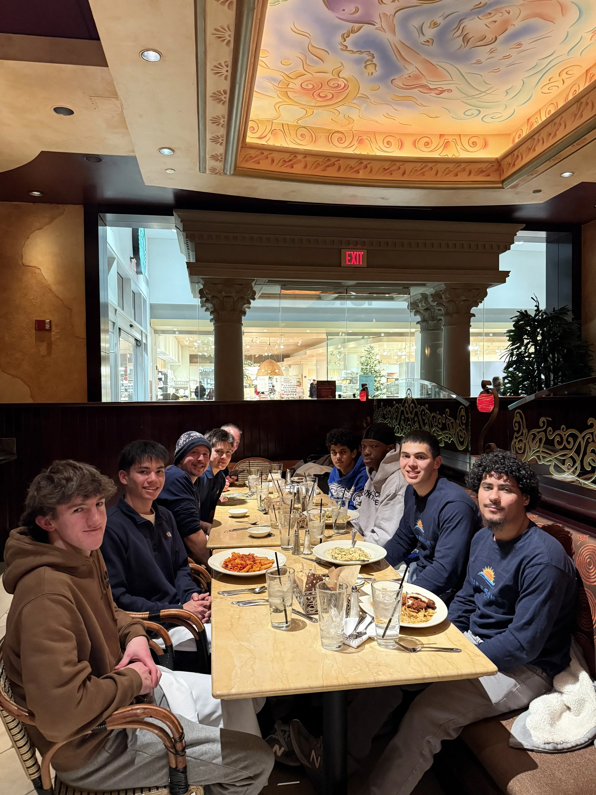 PureShine Home Services team at dinner celebrating teamwork and service excellence