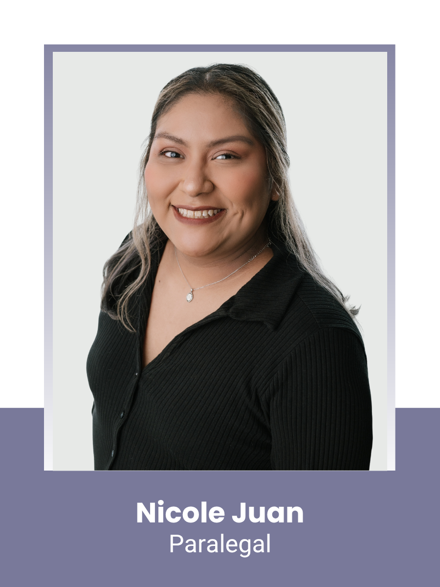 Professional portrait of Nicole Juan, a paralegal, smiling and wearing a black top and a necklace, against a plain background.