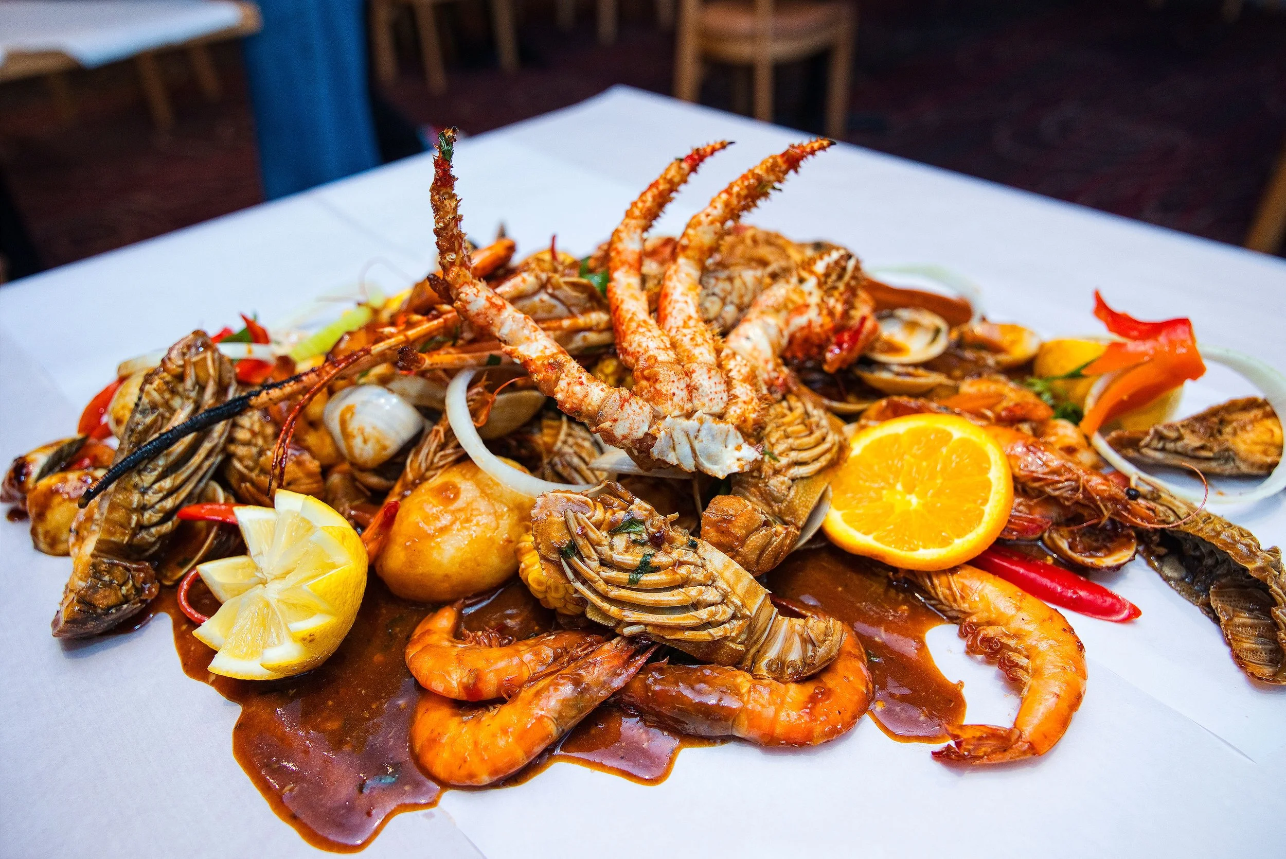 Lusso Signature Bag seafood boil with lobster, bay bugs, prawns and seafood at Lusso Tapas Blacktown