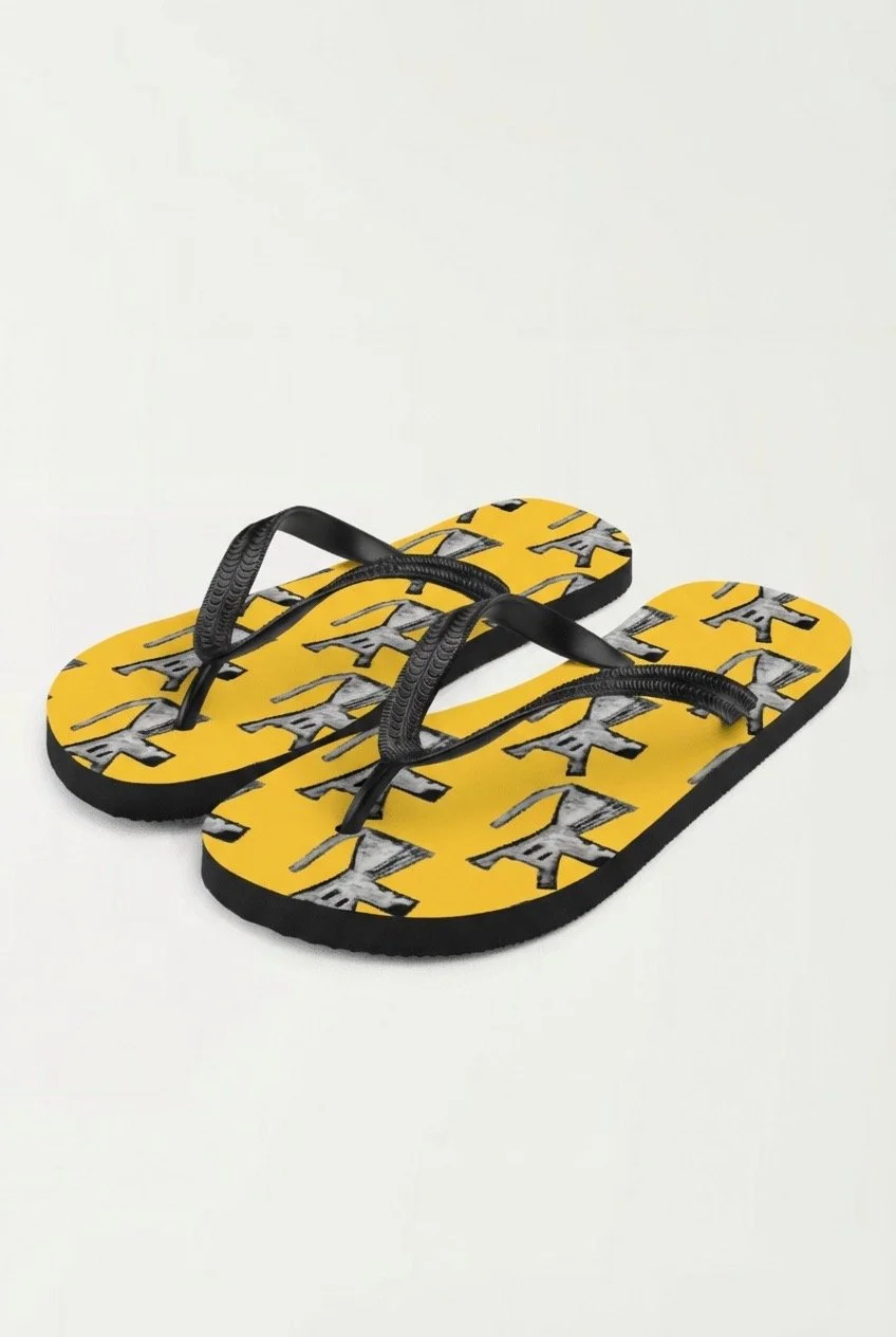art-of-m-mans-best-friend-flip-flops-side.jpeg