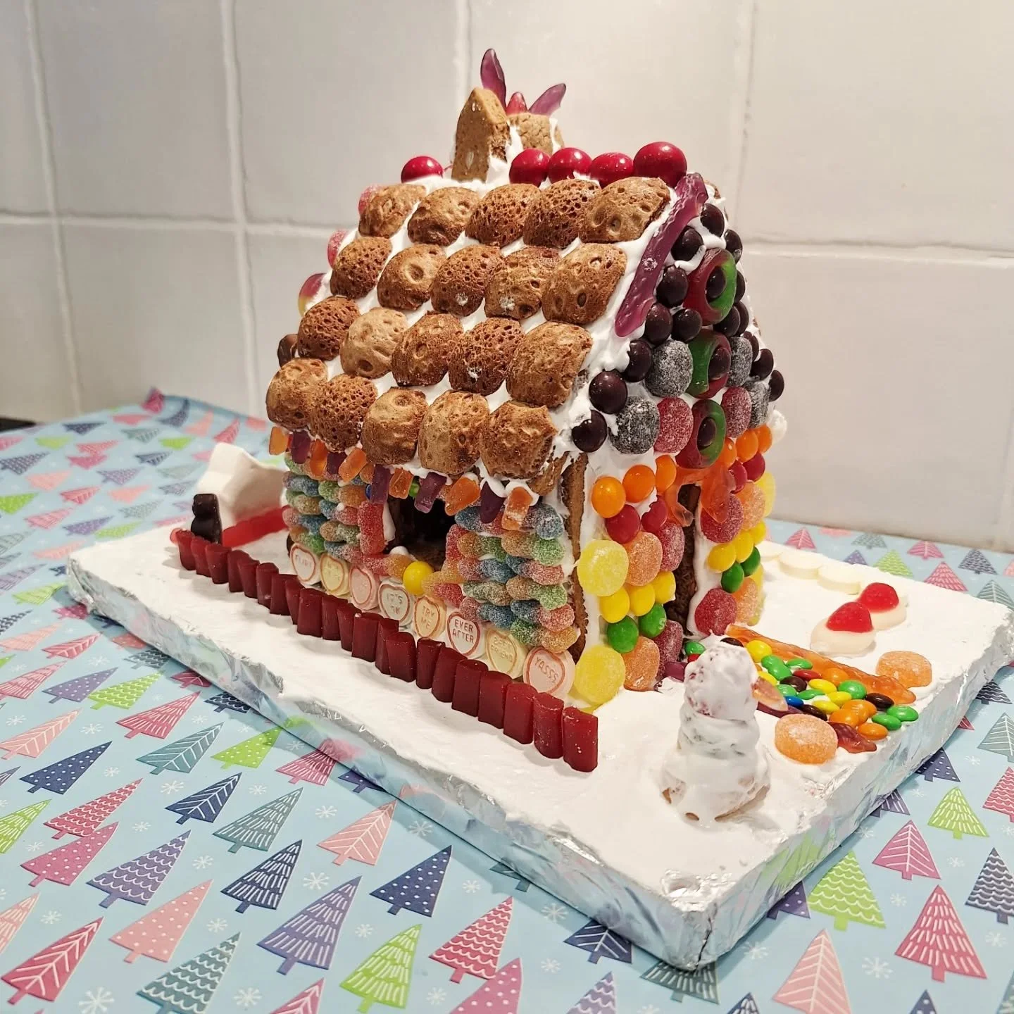 Every year we get together with our friends for our annual "Gingerbread House Competition". It is VERY competitive, but every year we also involve our kids. They LOVE decorating the gingerbread (mine still do cookies cos they are too little