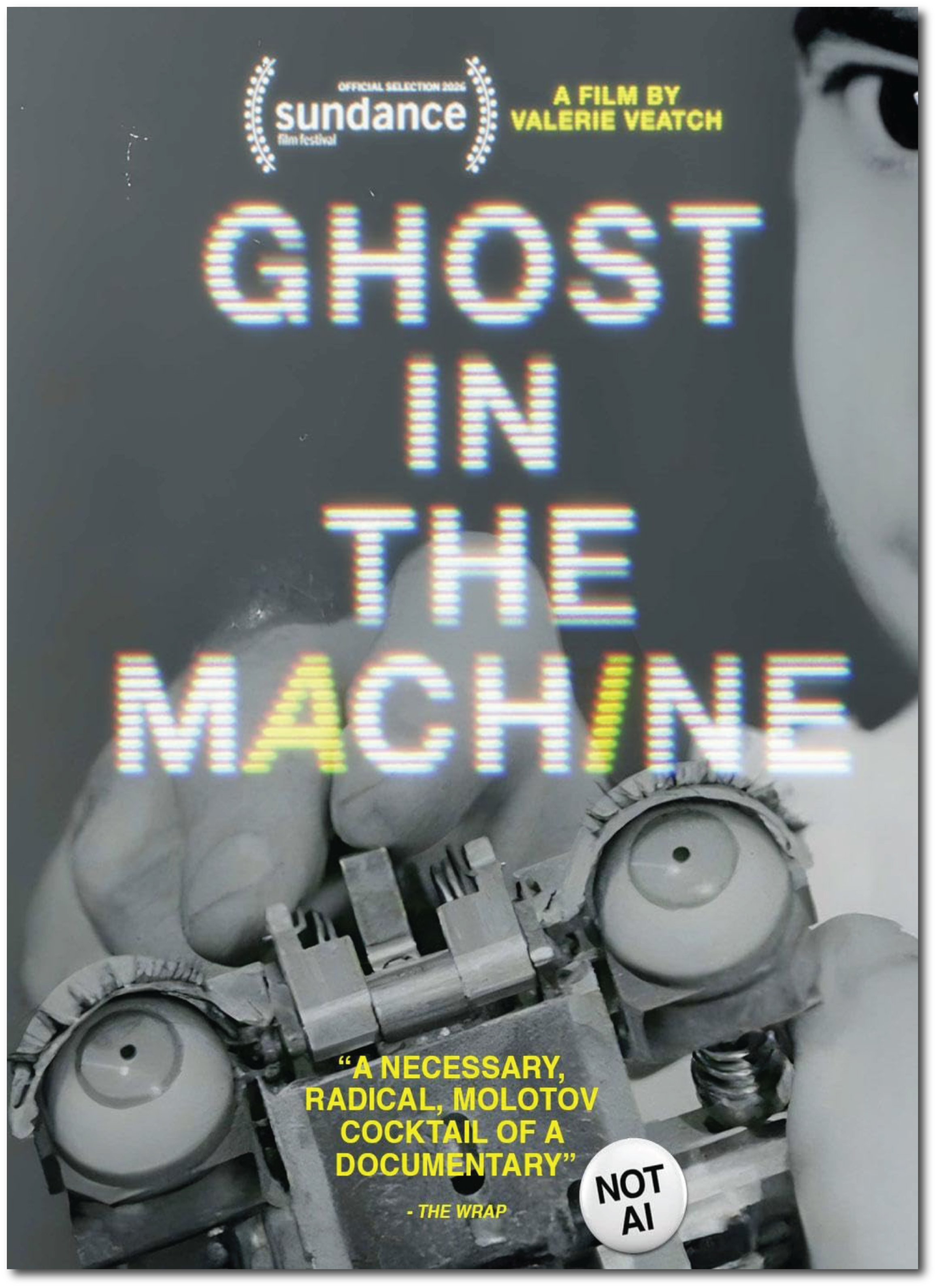 Close-up of a poster for the film "Ghost In The Machine" by Valerie Veatch, featuring technological imagery and a quote from The Wrap. The design incorporates a VHS tape aesthetic and bold yellow text with film festival laurels.