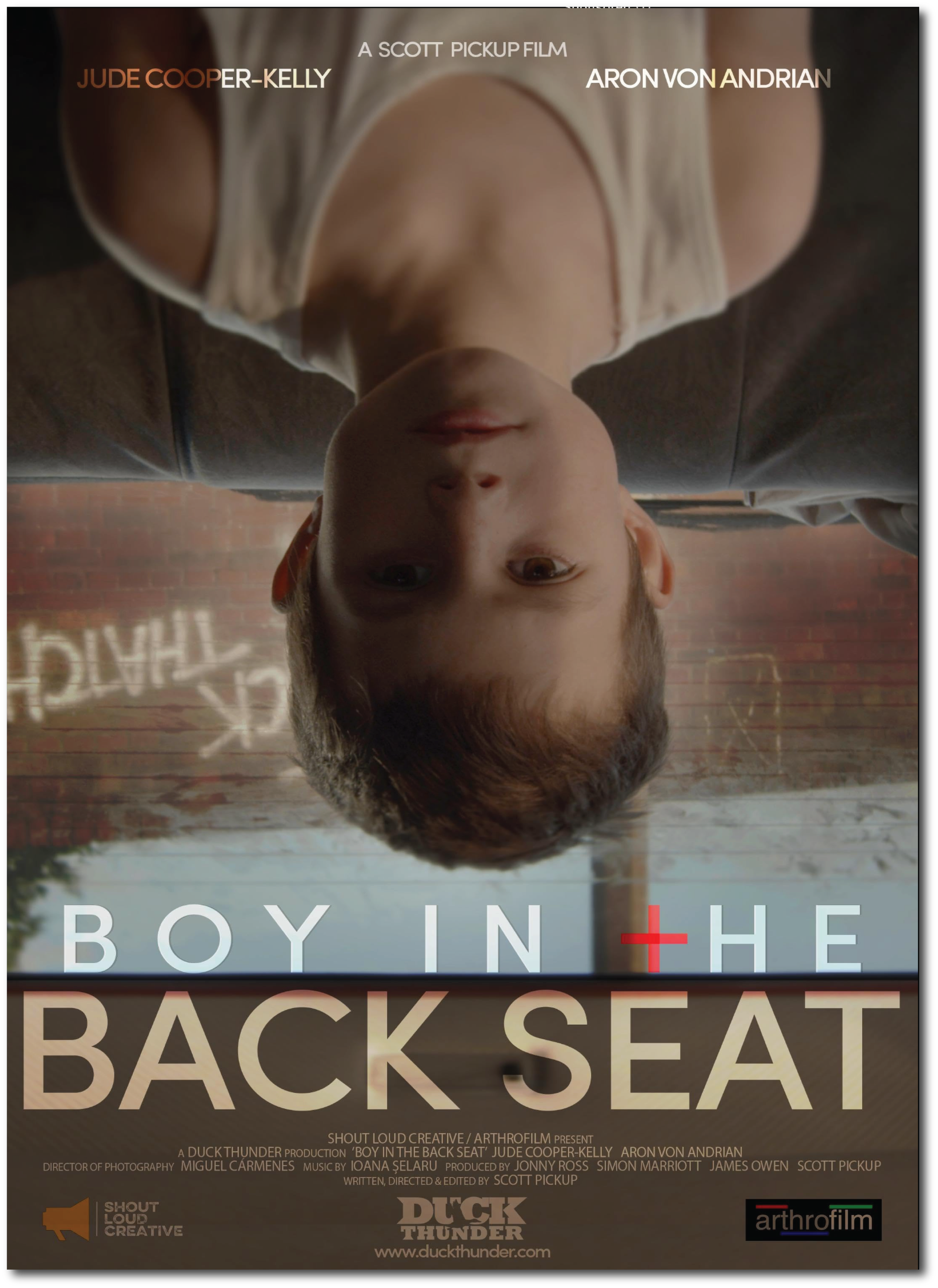 BoyInTheBackSeat.png