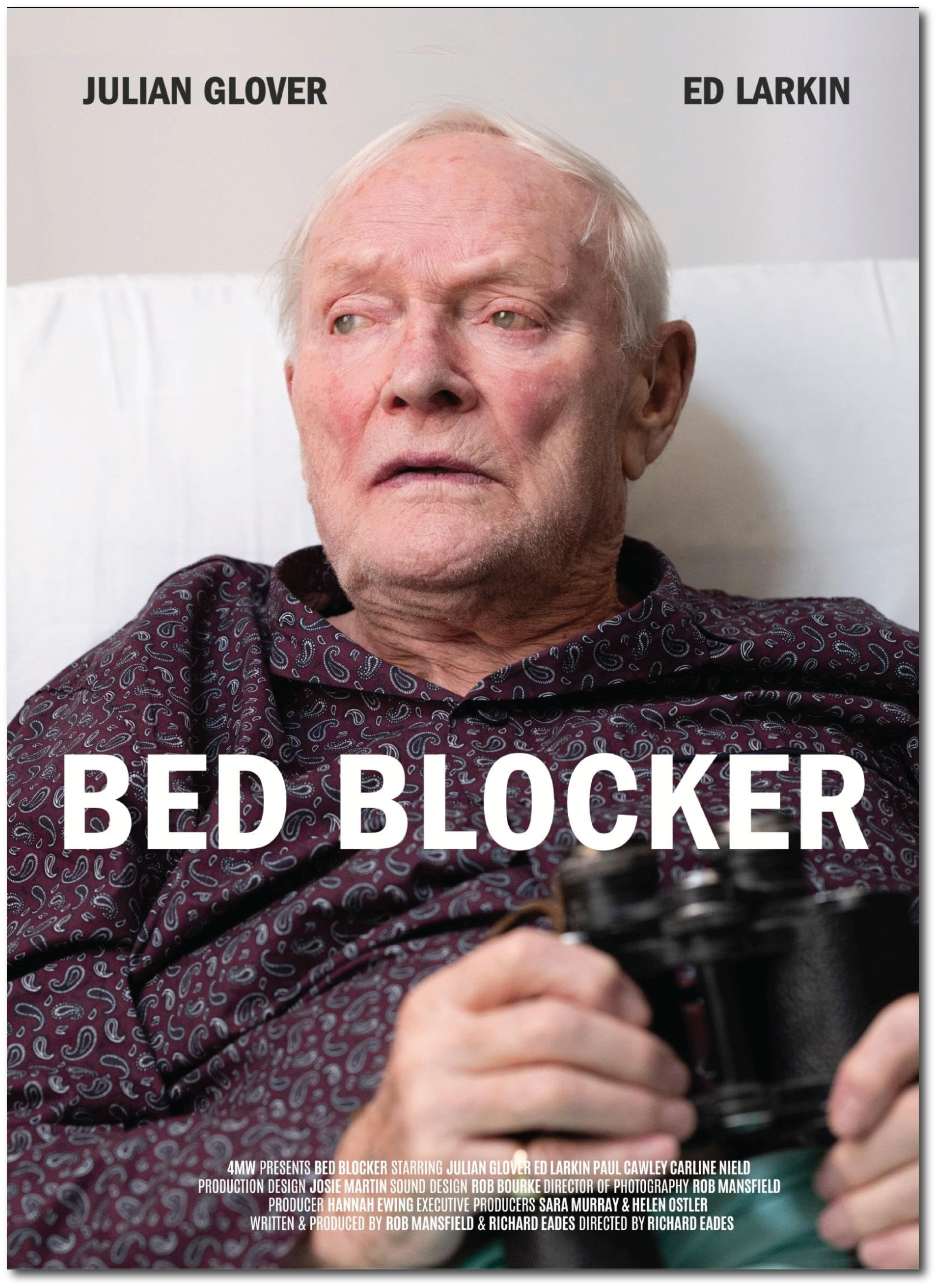 Poster for a film titled "Bed Blocker" featuring an elderly man with white hair, a slightly red face, lying in bed and holding a gun. The top of the poster lists actors Julian Glover and Ed Larkin. The bottom contains additional credits and production information.