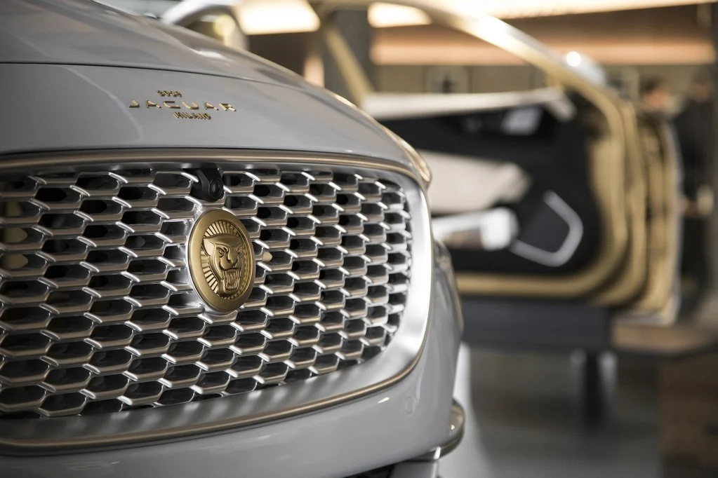 Close-up of a Jaguar car grille and logo