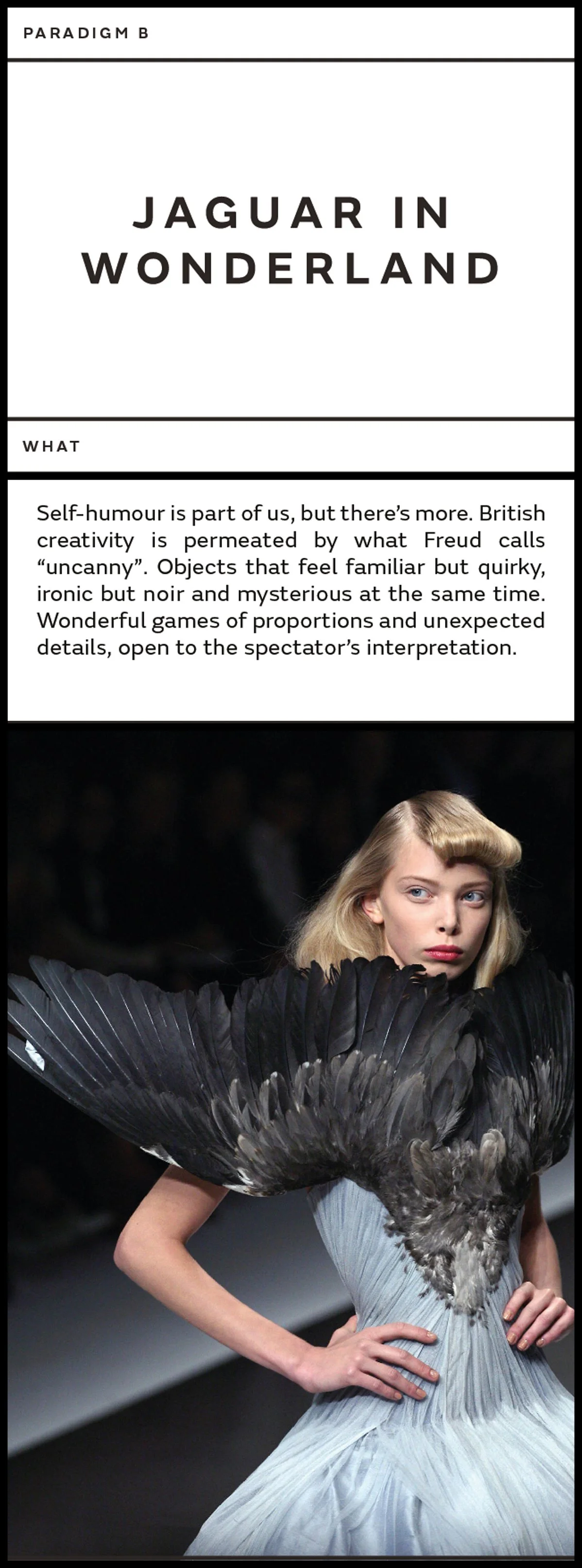 Fashion model on runway wearing dress with black feather design.