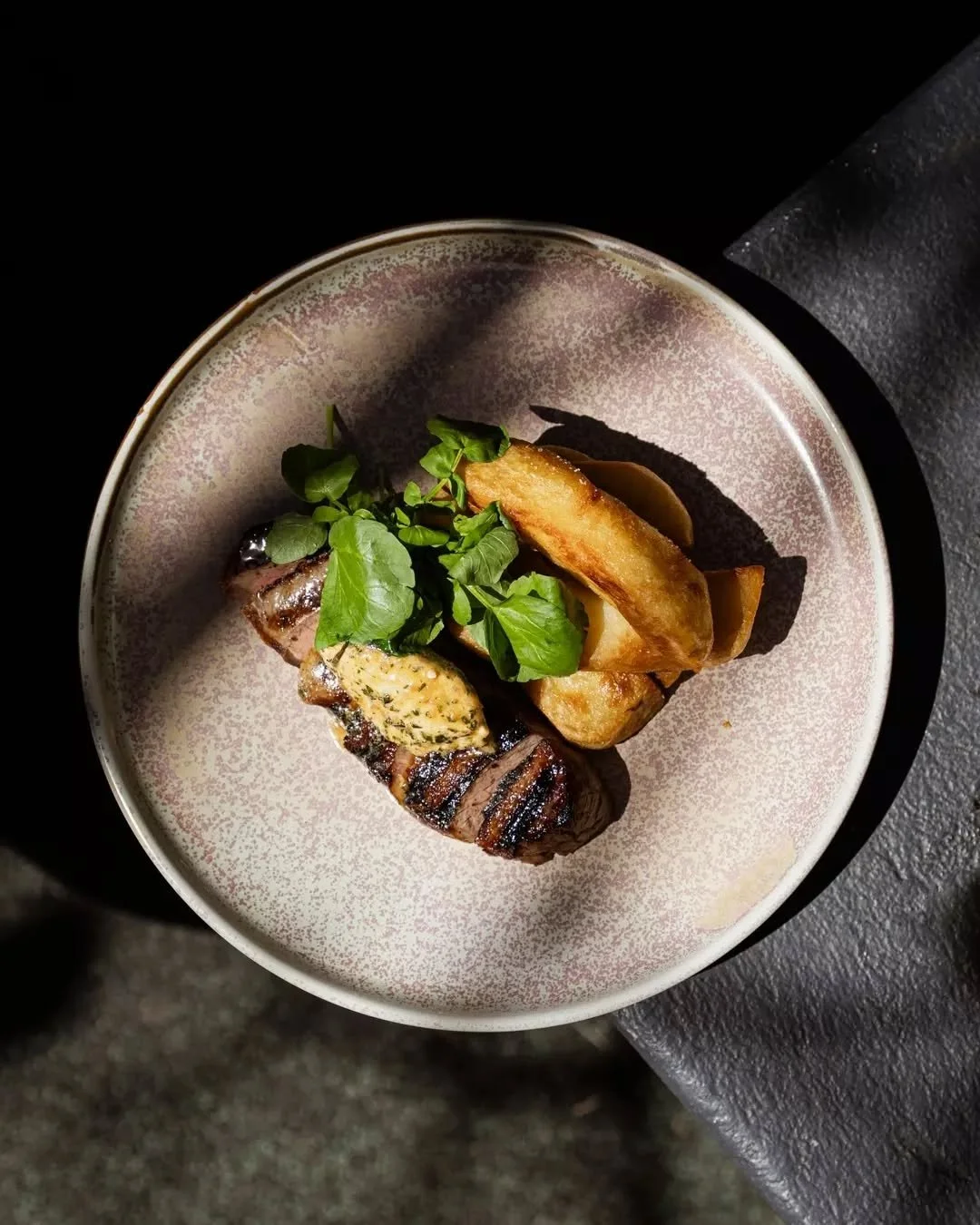 Steak cooked to your liking, chips, watercress. Choose your sauce from red wine gravy, bone marrow &amp; thyme, mushroom, pepper or garlic butter.