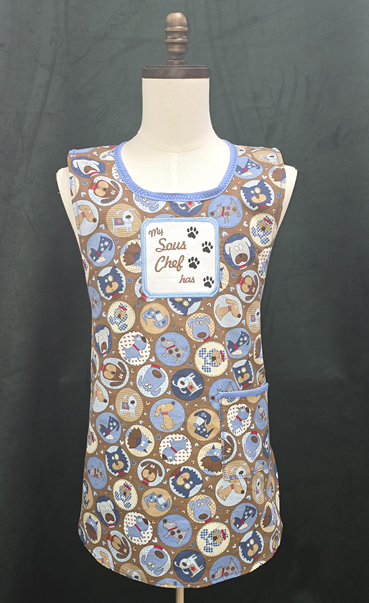 “My Sous Chef Has Four Paws” hand-tailored dog print apron