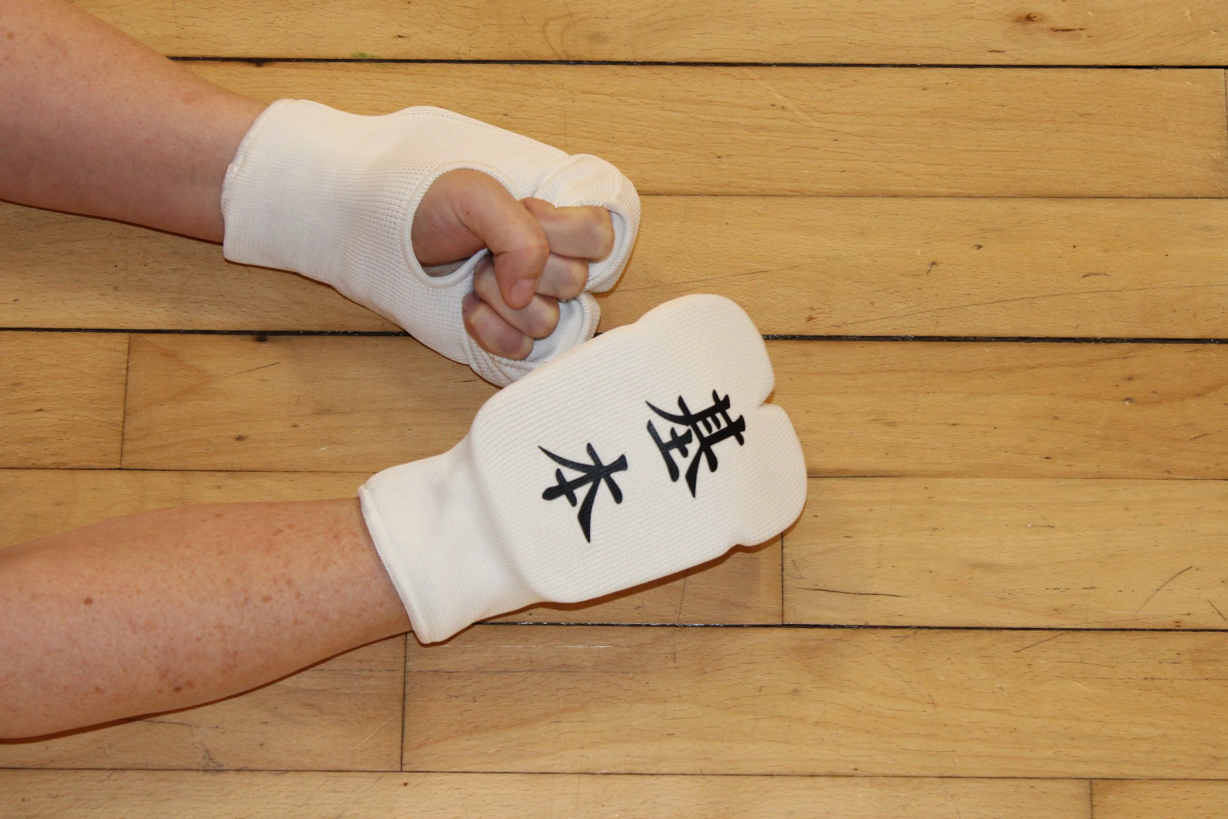 kyokushin karate clicker mitts or gloves in the dojo