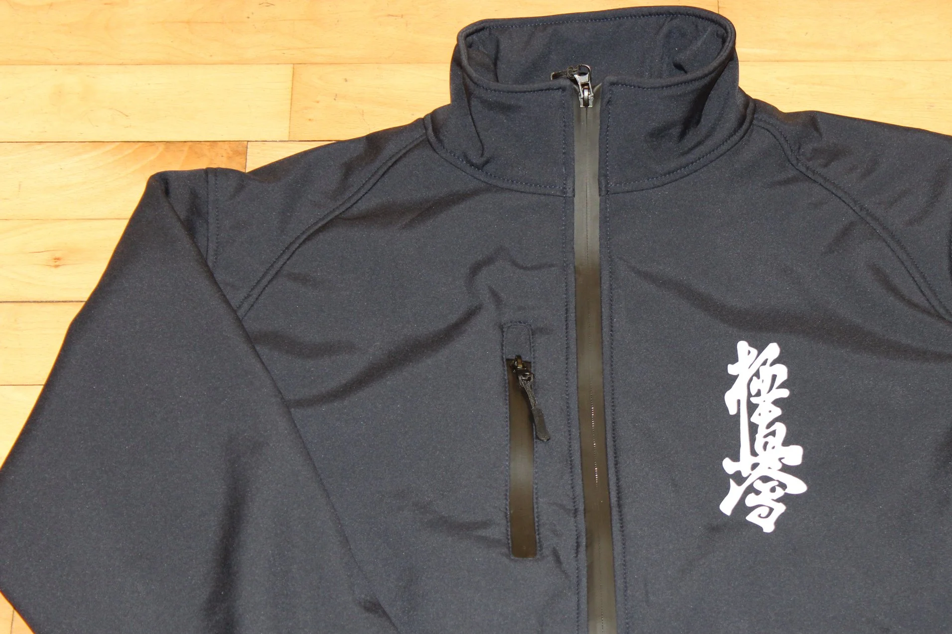 Navy jacket with kyokushin karate kanji in white