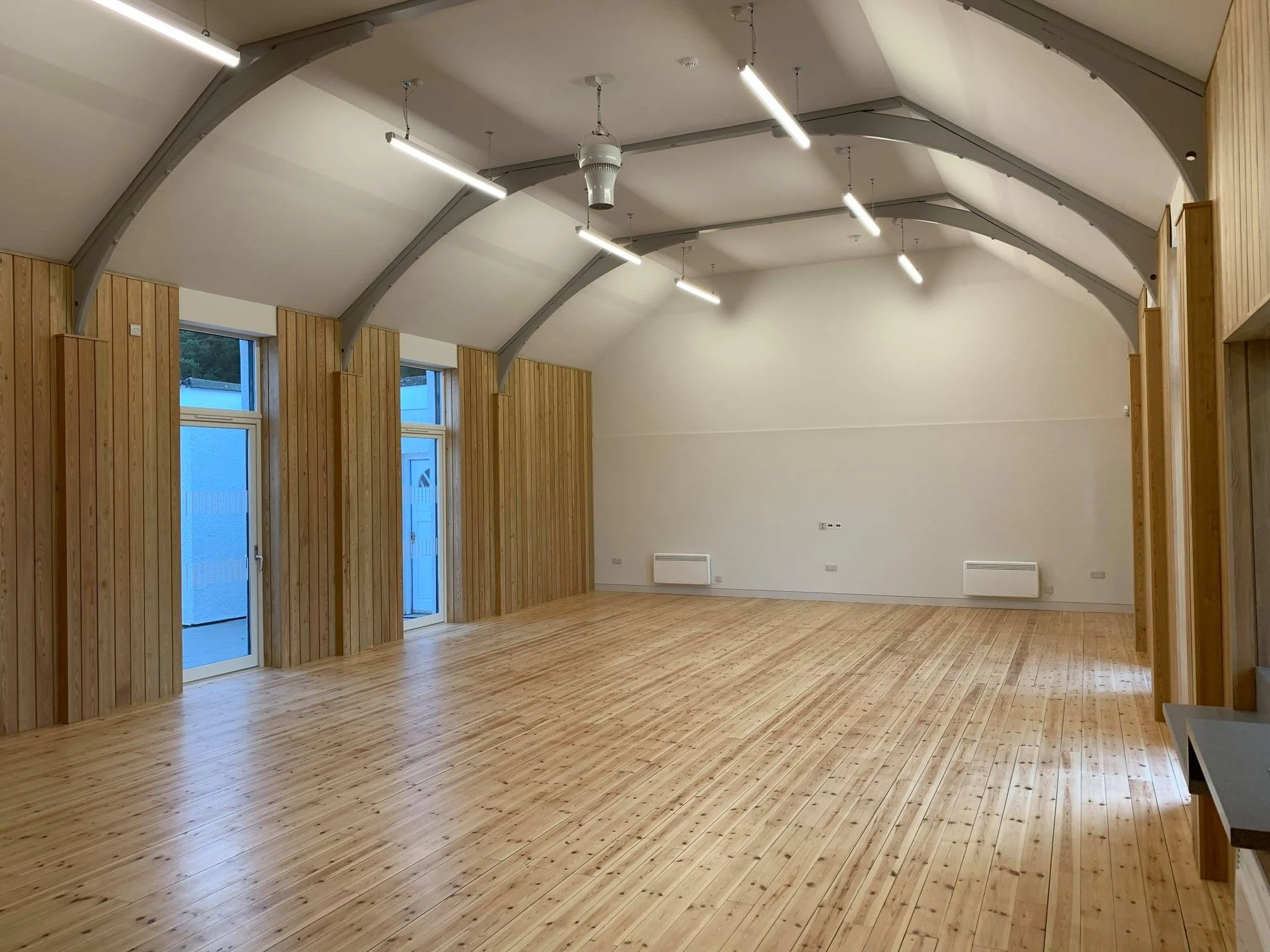 church hall interior renovation wooden flooring