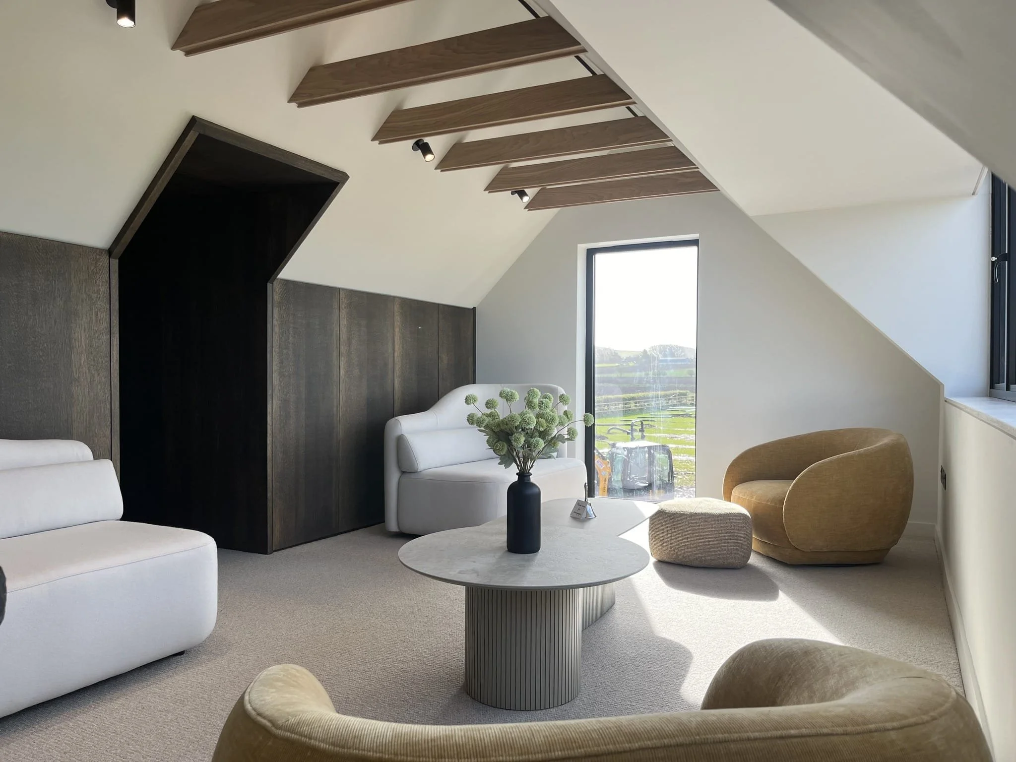 Attic Conversion living room with large window