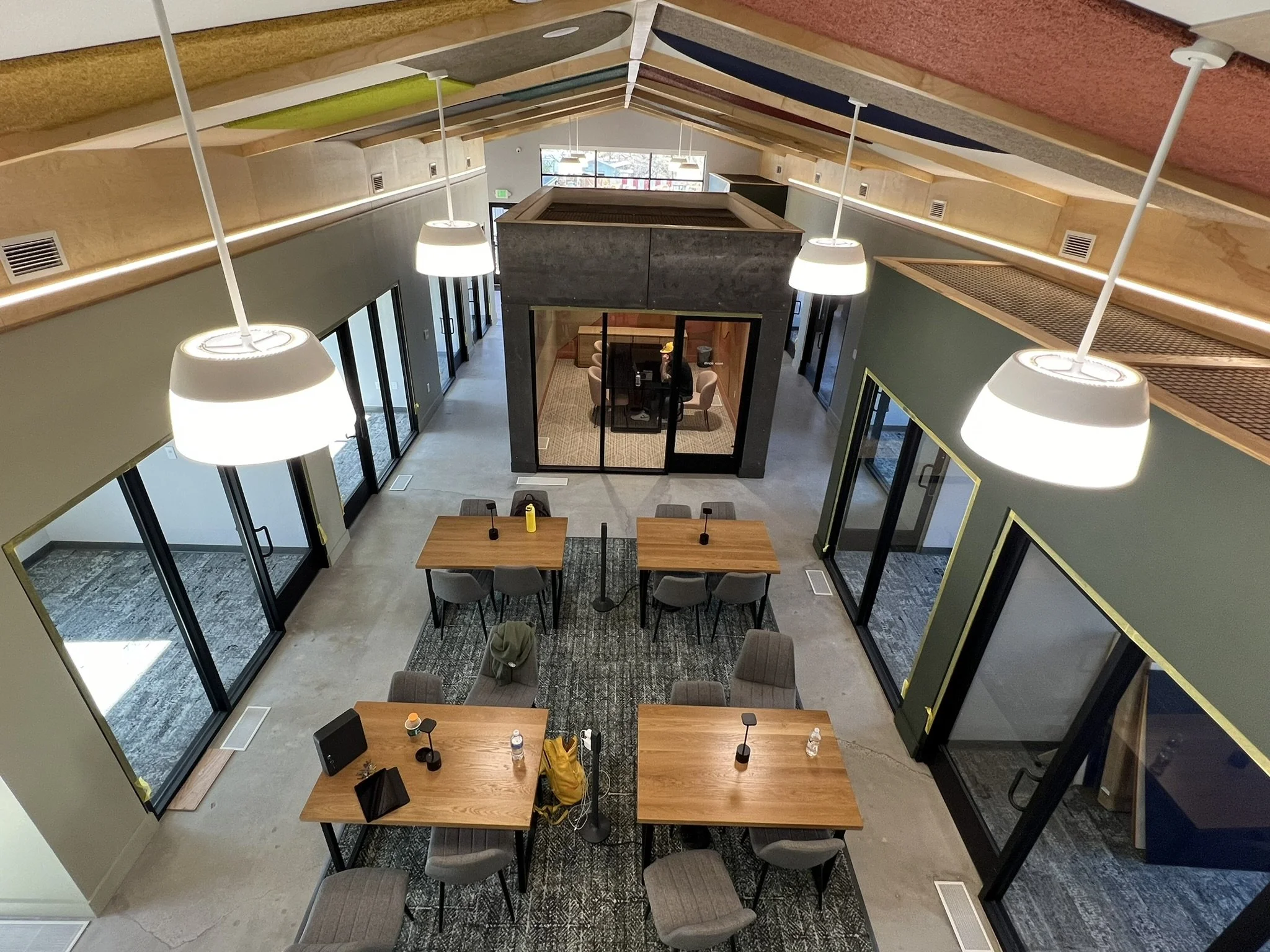  Strategic openings between floors create visual connections that allow occupants to experience the building's various activities and spaces. 