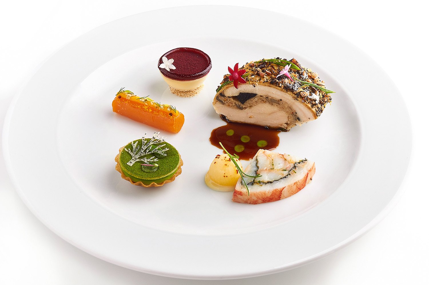Elegant fine dining appetizer with precisely plated sauce dots, baby carrots, and mushroom pieces on a wide white plate, shot on a clean marble tabletop