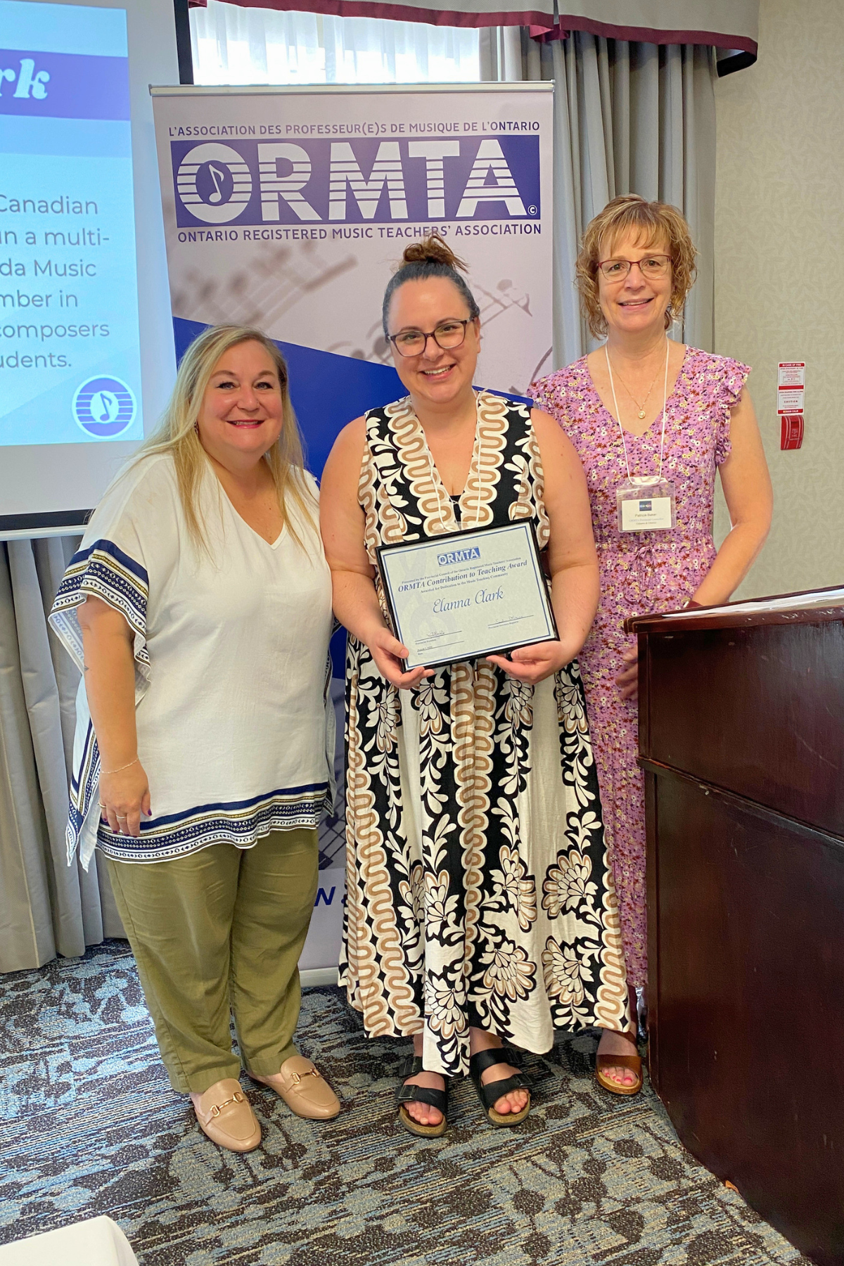 OCTA Recipient Elanna Clark, with ORMTA Board Chair Tania Granata, and OCTA/Pedagogy Convenor Patricia Baker.