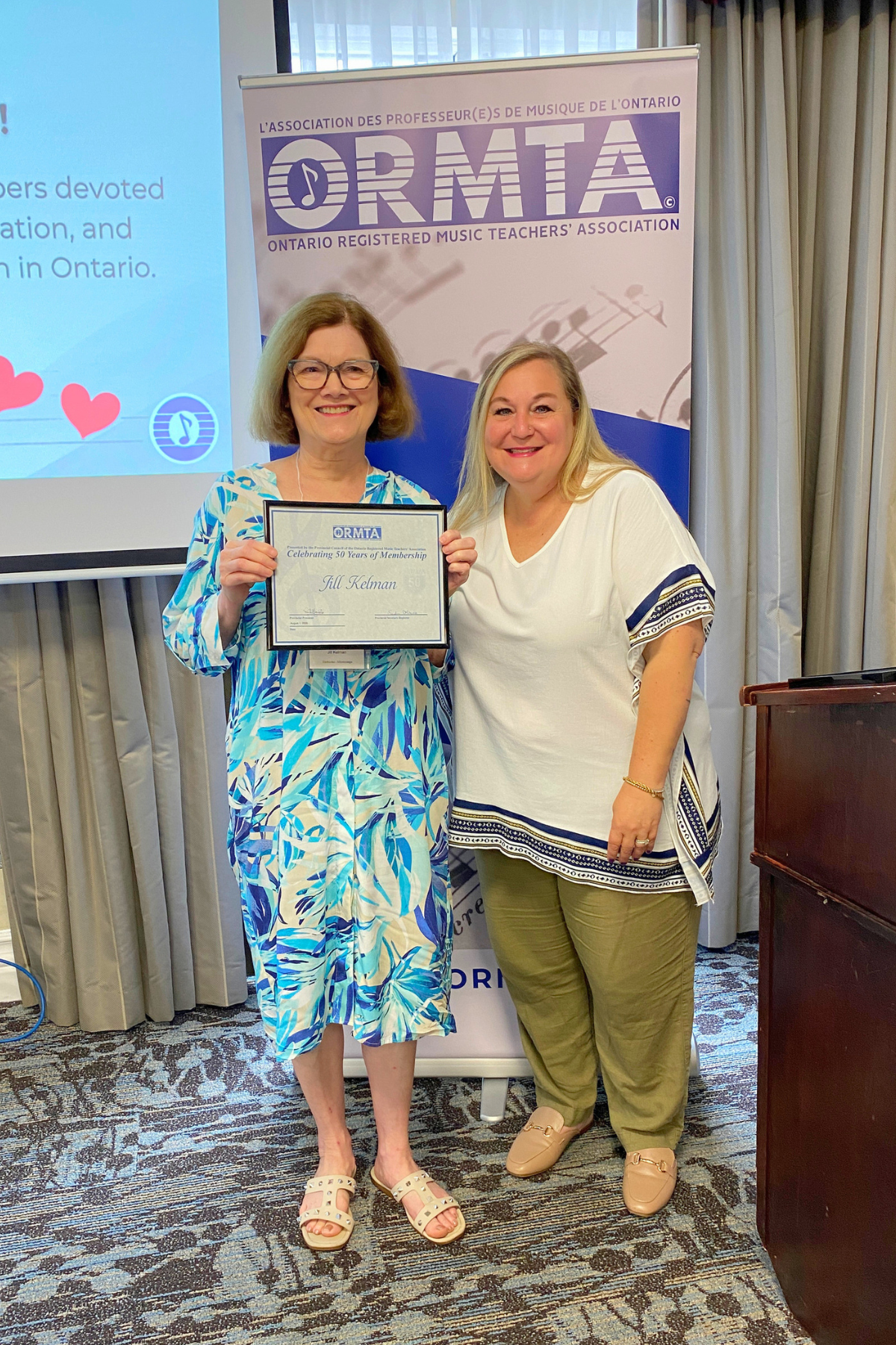 50-year member Jill Kelman with ORMTA Board Chair Tania Granata.