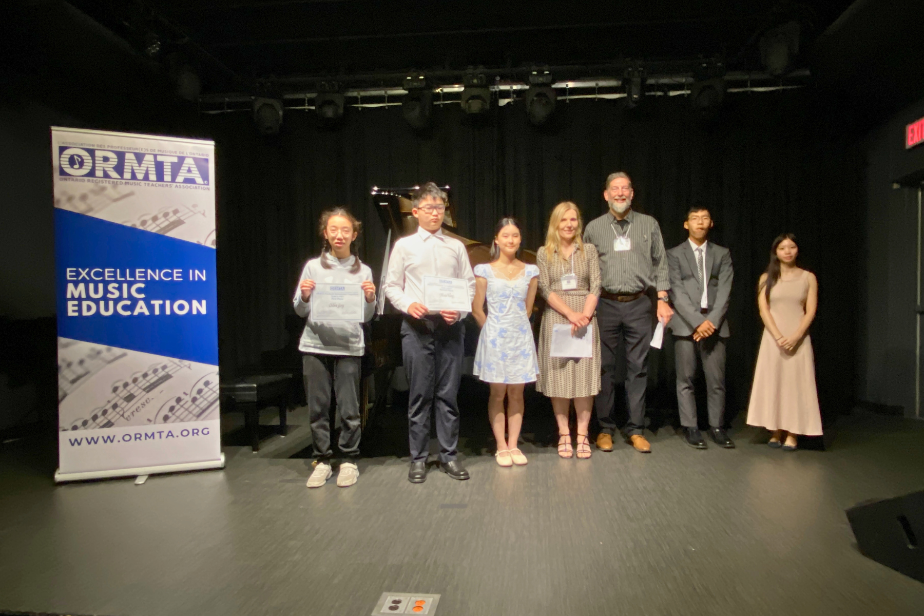 Level 8/9 Piano Competition winners and competitors, with the adjudicators