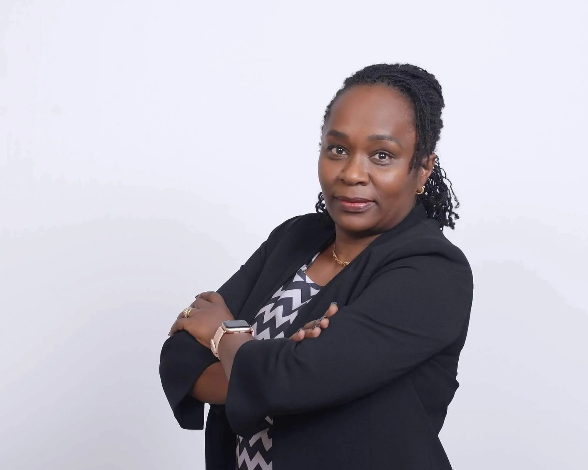 Portrait of Caroline Mbugua board certified Psychiatric Mental Health Nurse Practitioner