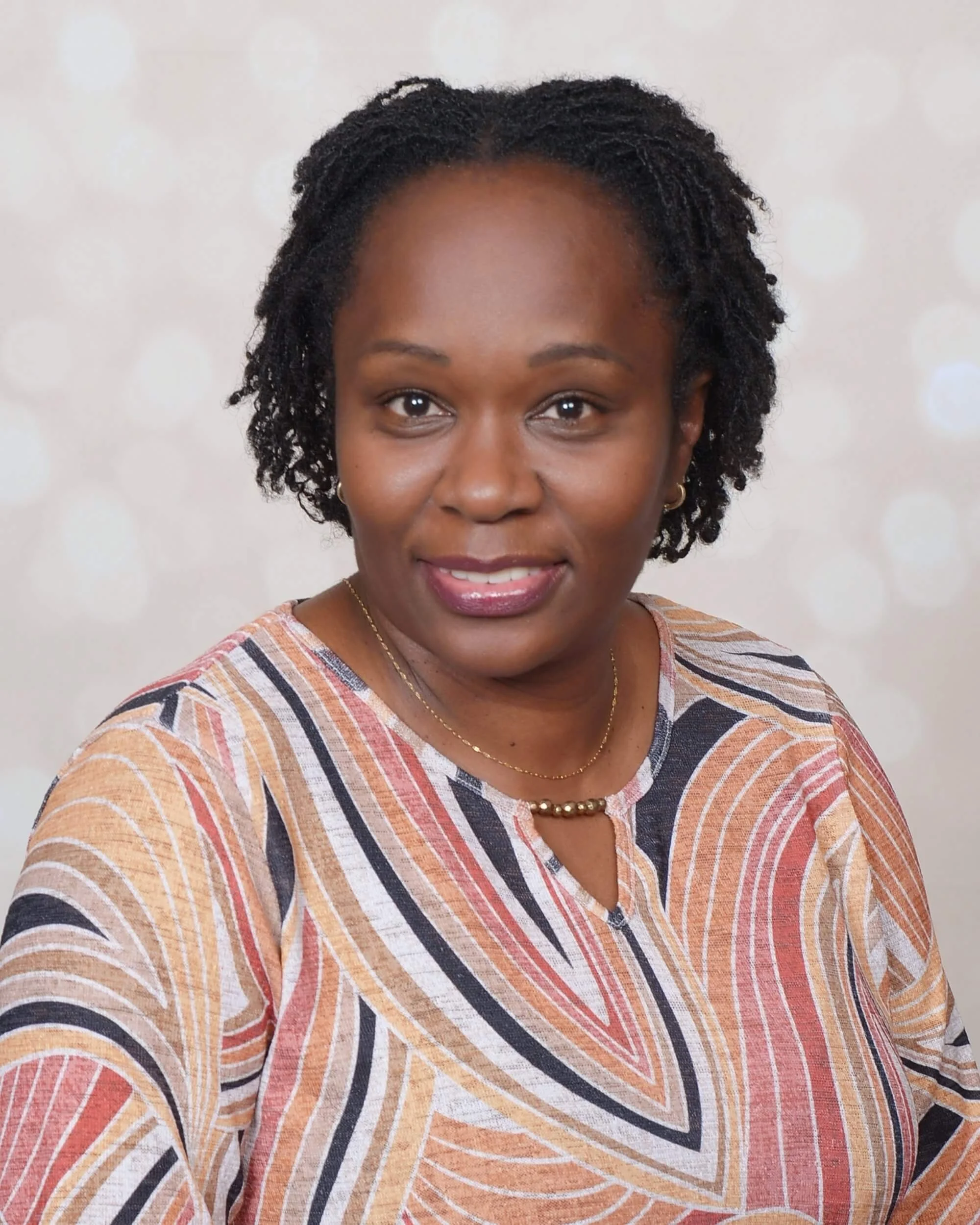 Portrait of Caroline Mbugua, PMHNP — Psychiatric Nurse Practitioner in The Woodlands