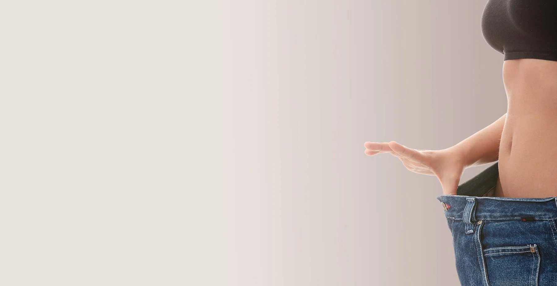 Woman demonstrates her weight loss in St. Catharines at Contour Medical