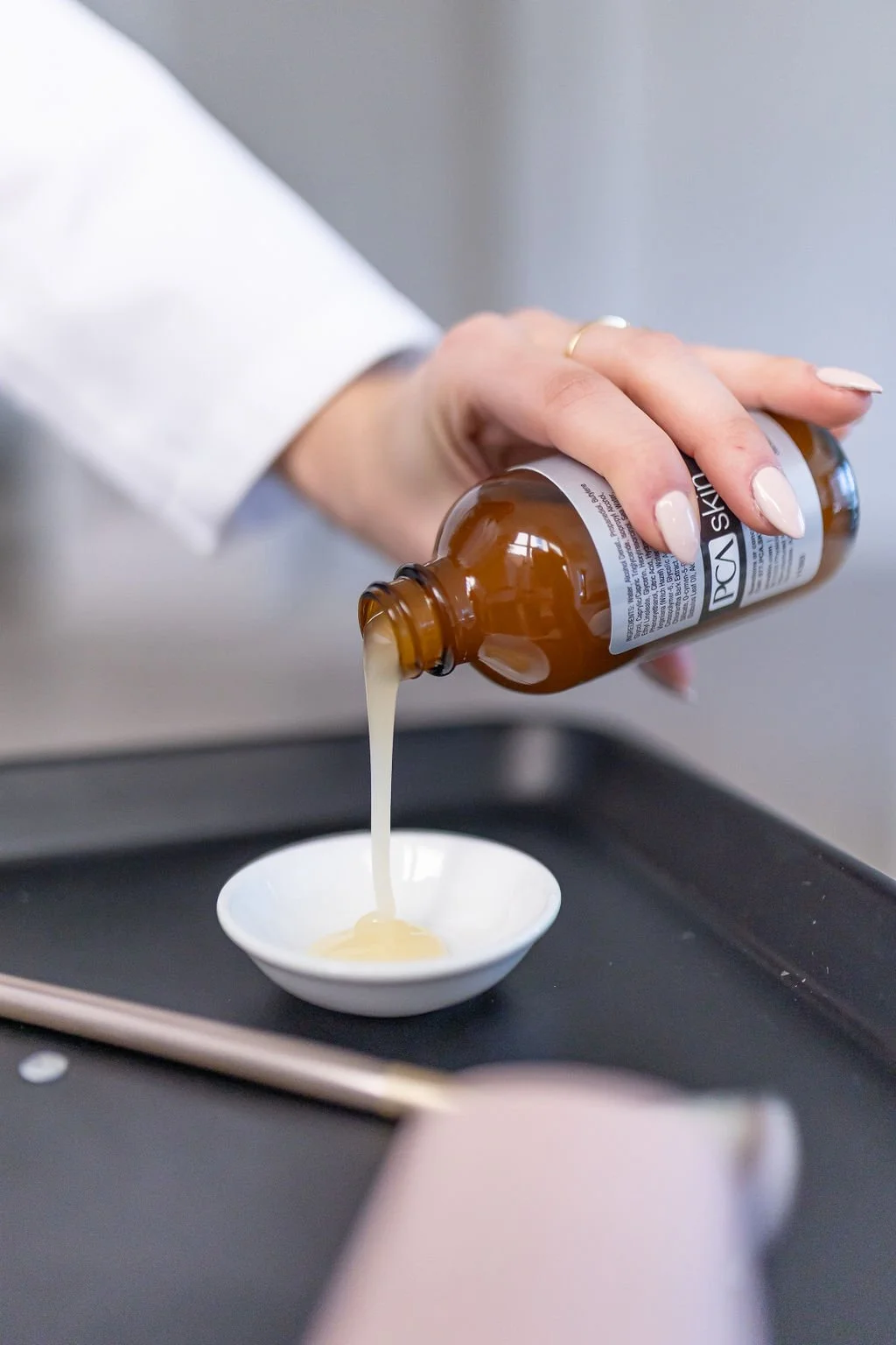 Licensed Nurse Practitioner Cassandra (Cassie) Cimino preparing to perform a chemical peel in St. Catharines