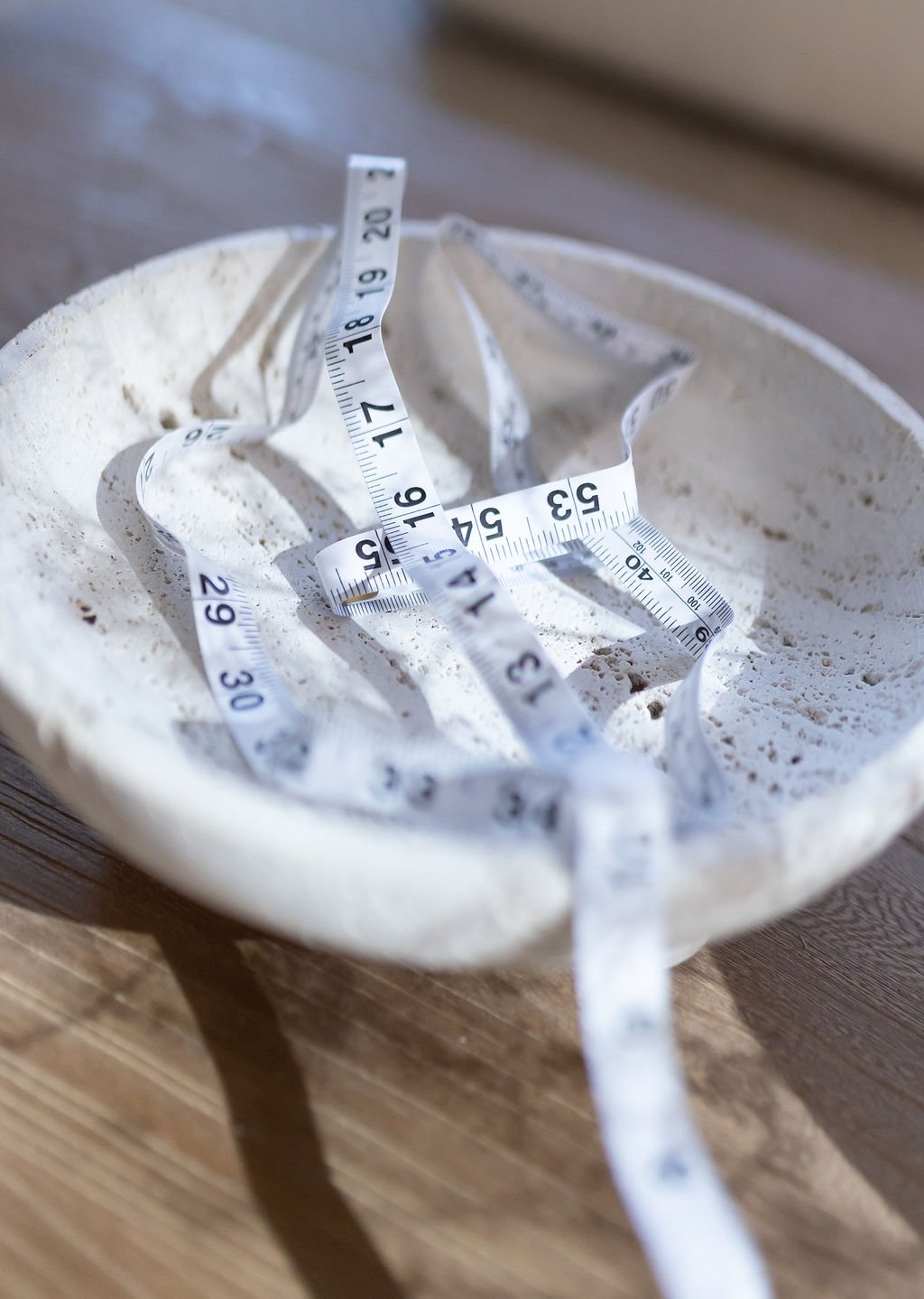 measuring tape in a dish in the exam room at Contour Medical Niagara