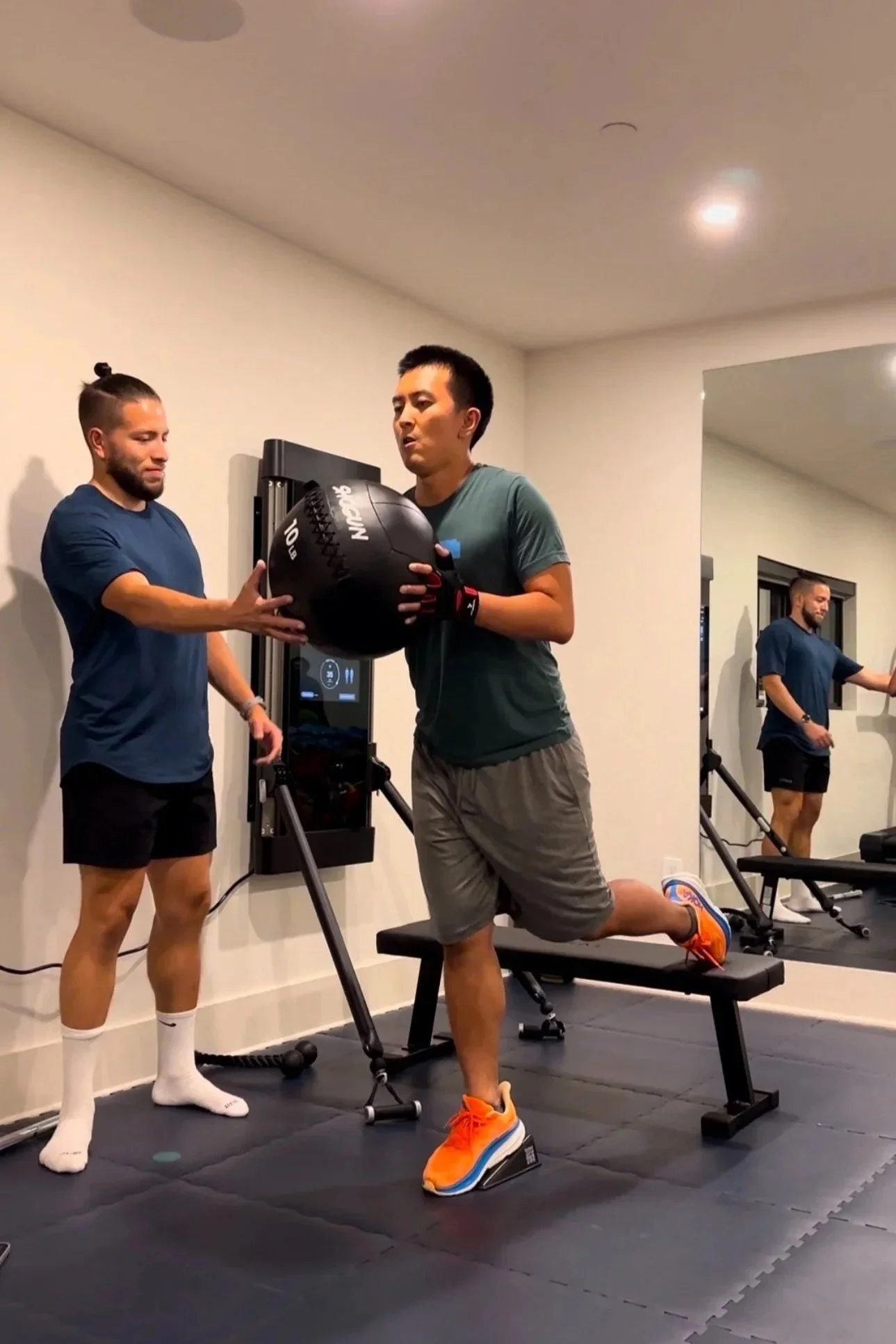 In-home personal training session in Austin Texas with Orofit Mobile Training coach and client.