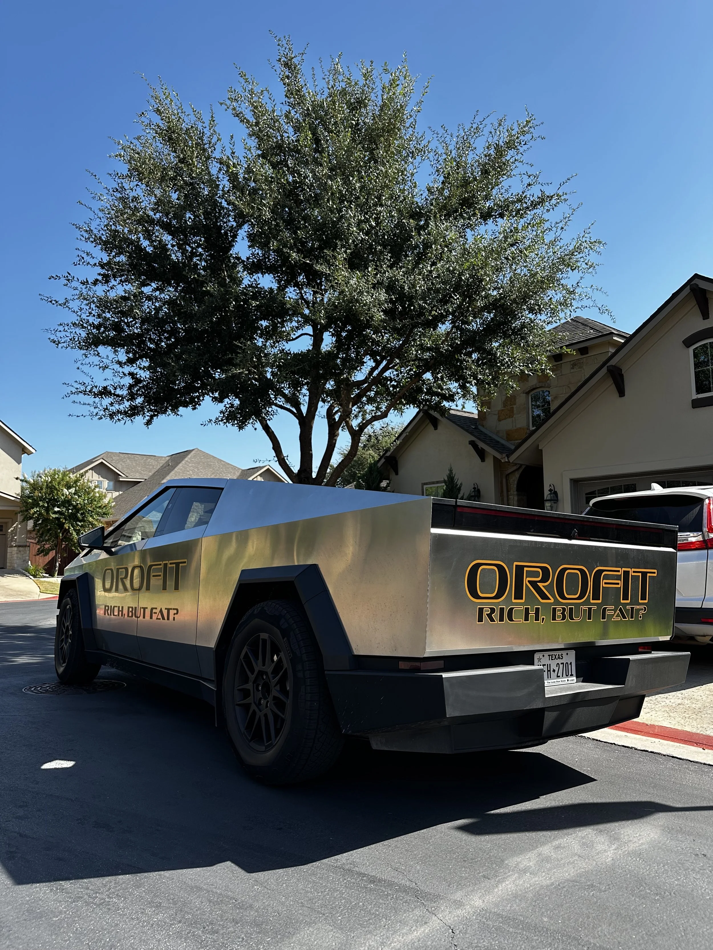 Orofit Mobile Training coach unloading professional fitness equipment from the Cybertruck for mobile personal training in Austin, Texas.