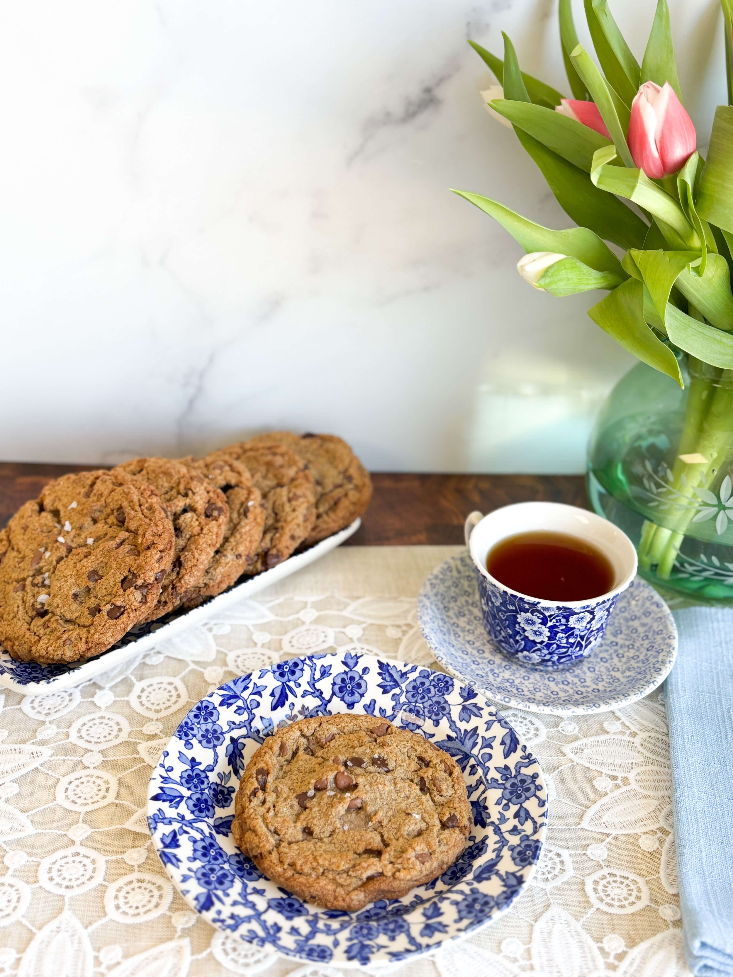 Homemade Brown Butter Chocolate Chip Cookies with tea and tulips at House of Marmalade