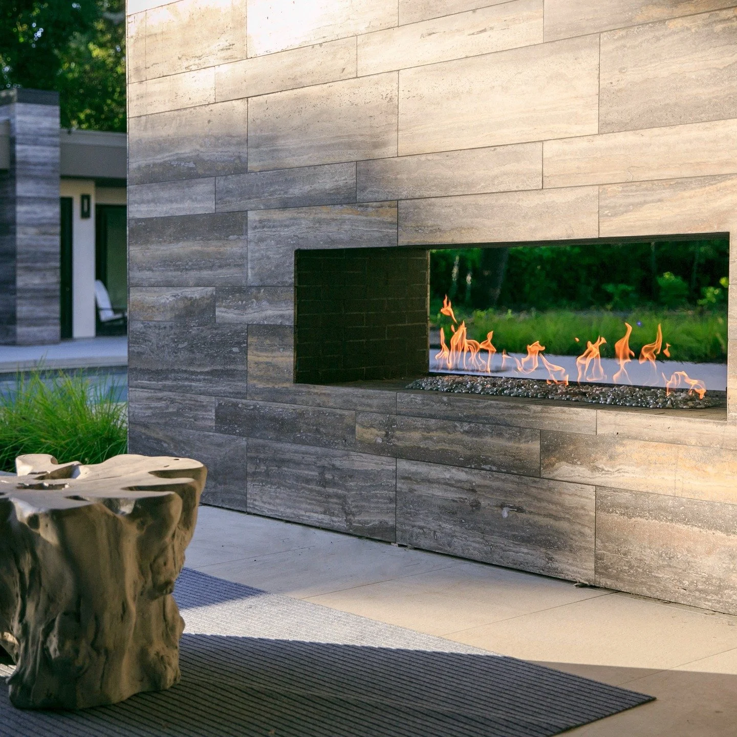 I'm curious! Looking for thoughts on a double-sided fireplace. Would you use a double-sided fireplace in your outdoor space? Why or why not? 

For us, a dual-sided fireplace is one of those design moments that quietly impacts a space. Not just connec