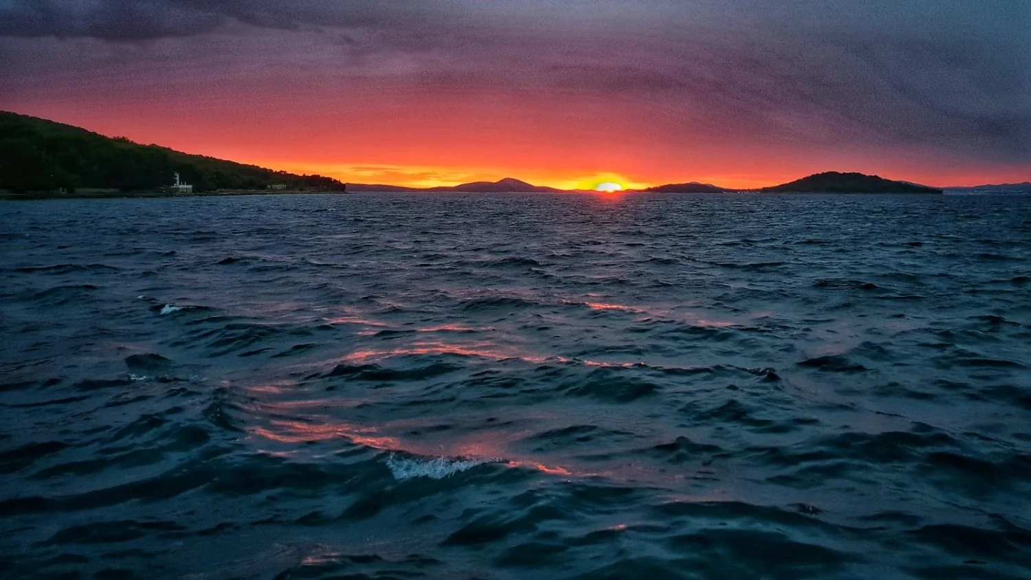 Warm sunset light over still water, representing settled nourishment and the Earth element in balance.