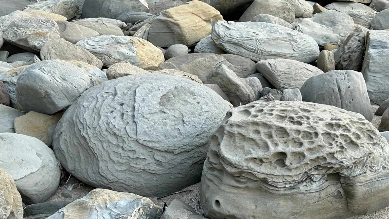 Weathered grey stones with different shapes and textures