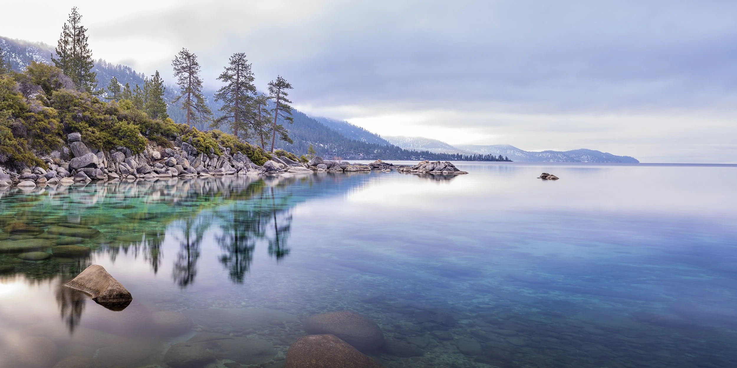 A misty ethereal morning on the shore of Lake Tahoe emotes a feeling of serenity and tranquility. Nature can be calm vast and powerful all at the same time. Immersing ourselves in that energy is healing.