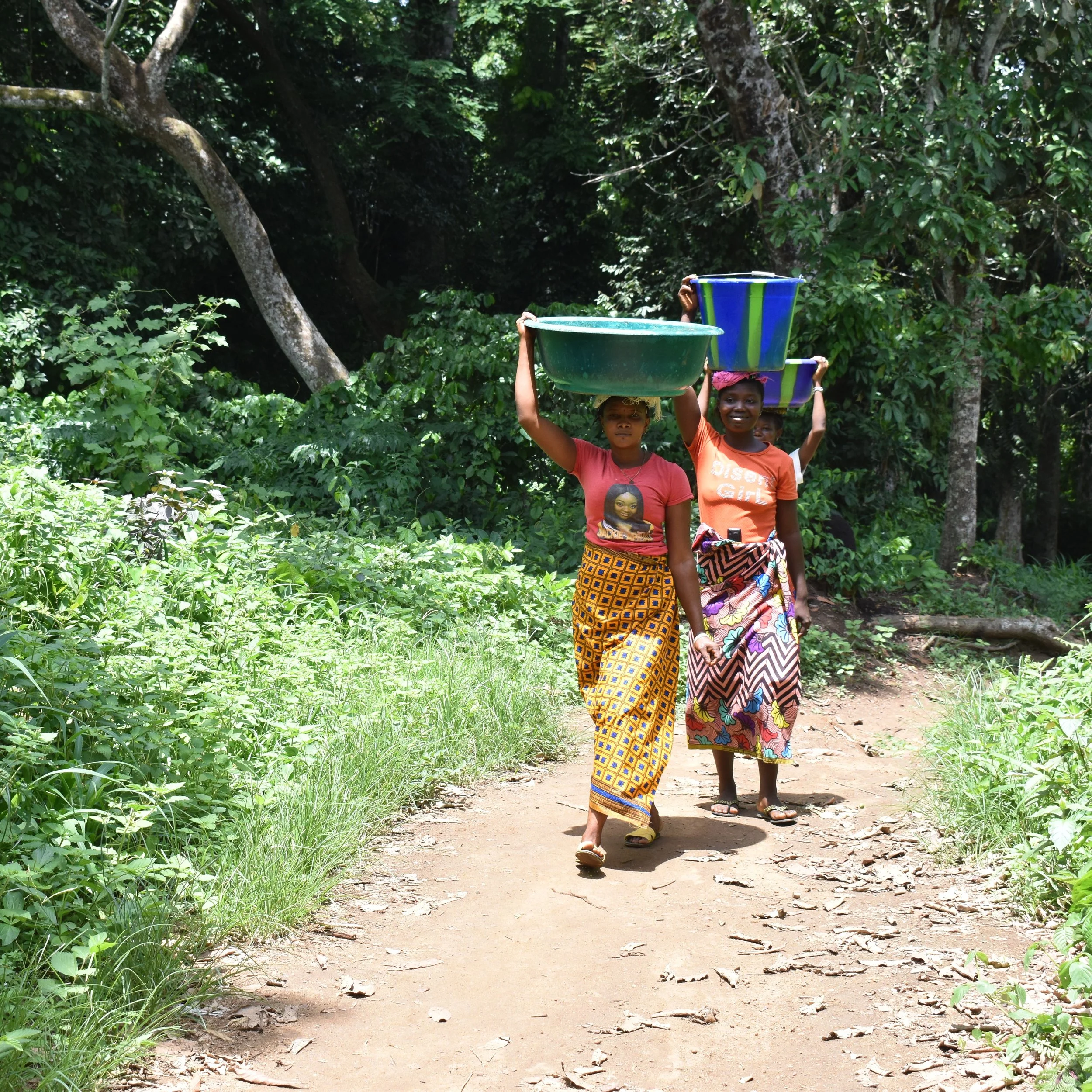 23-5-2022 Kambama ACT, community members fetching water from the spring Box.jpg