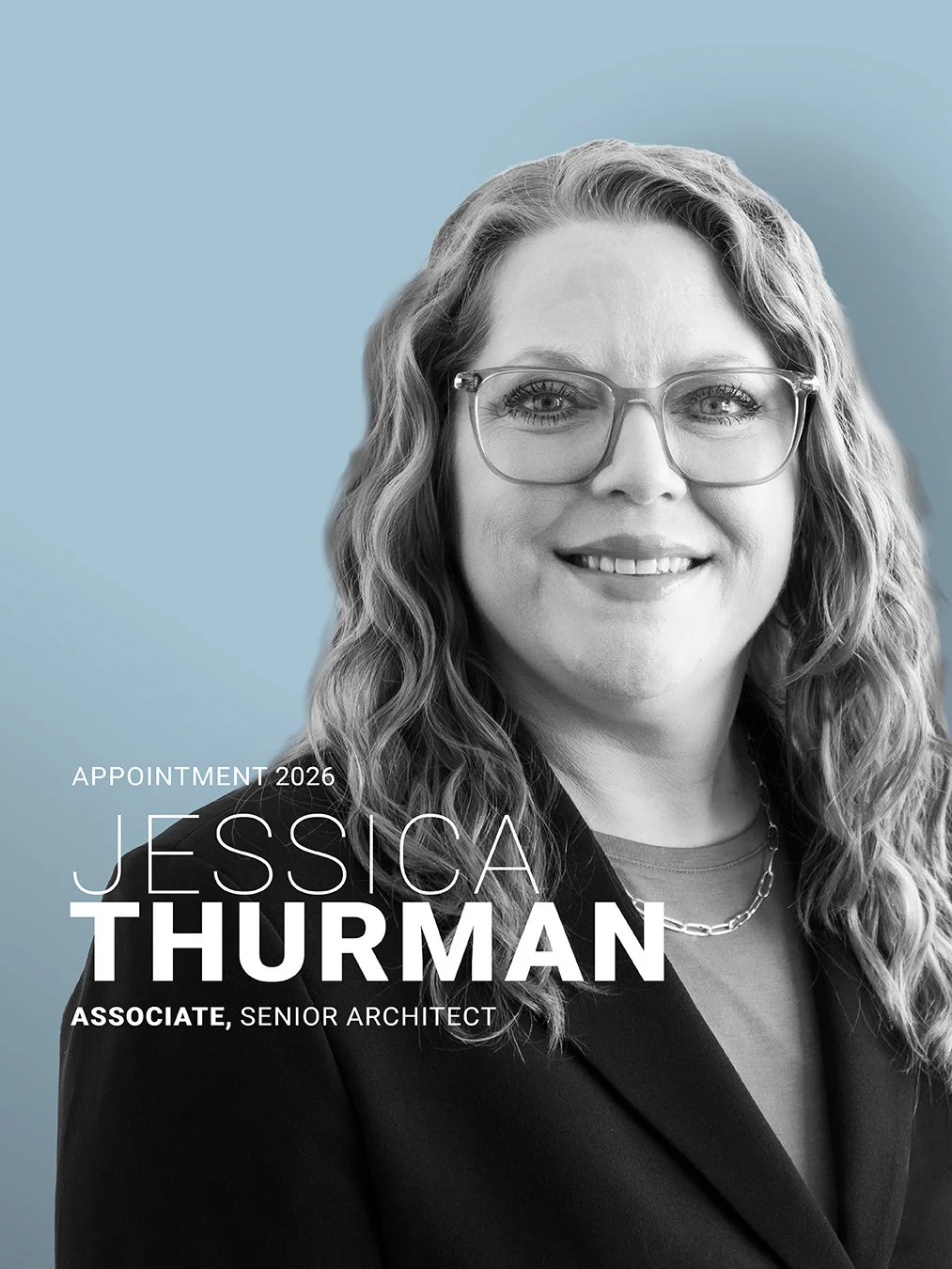 Jessica Thurman black & white headshot on blue background. Jessica has been elevated to Associate, Senior Architect.