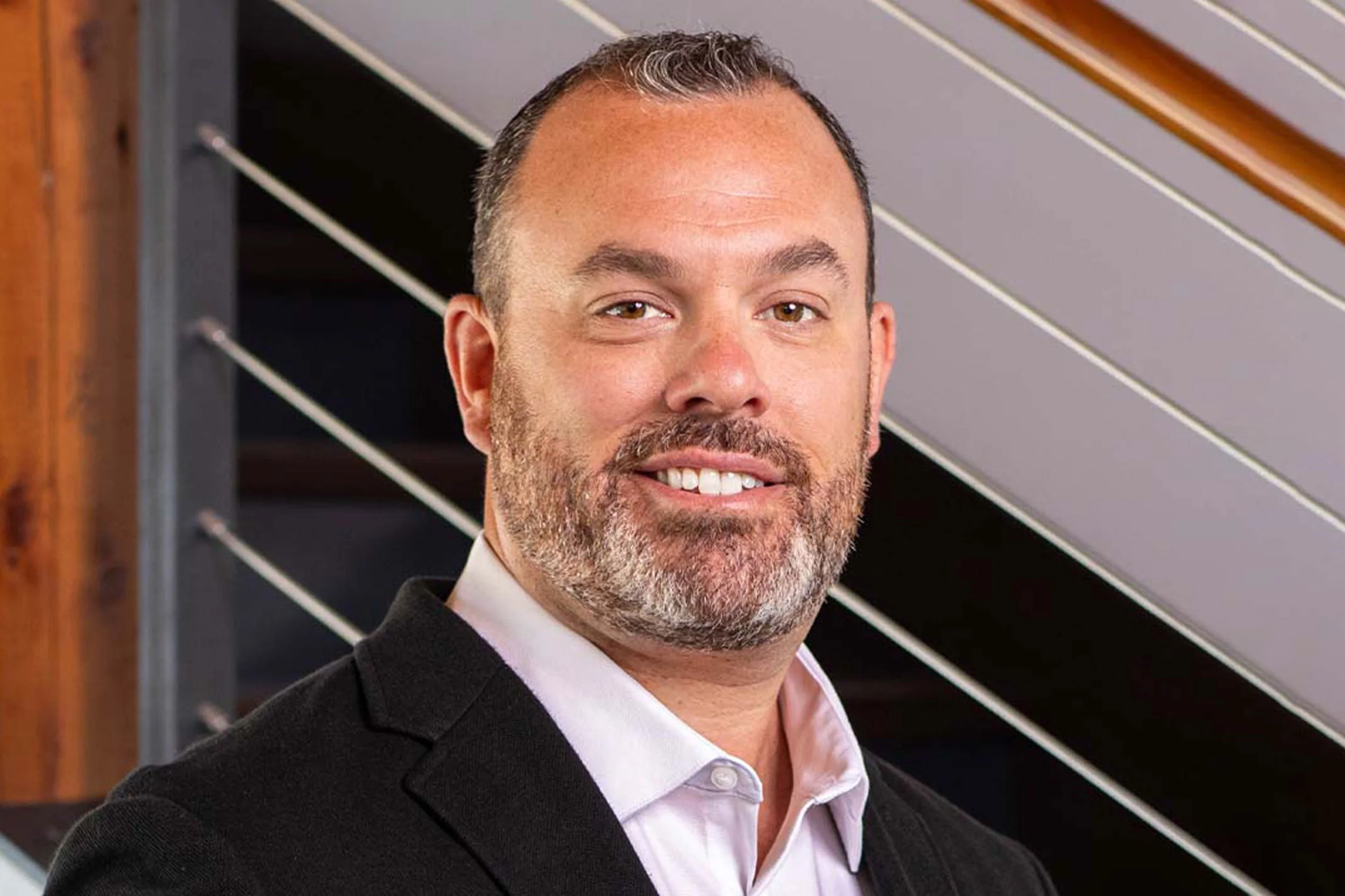 Sam Beard in black blazer