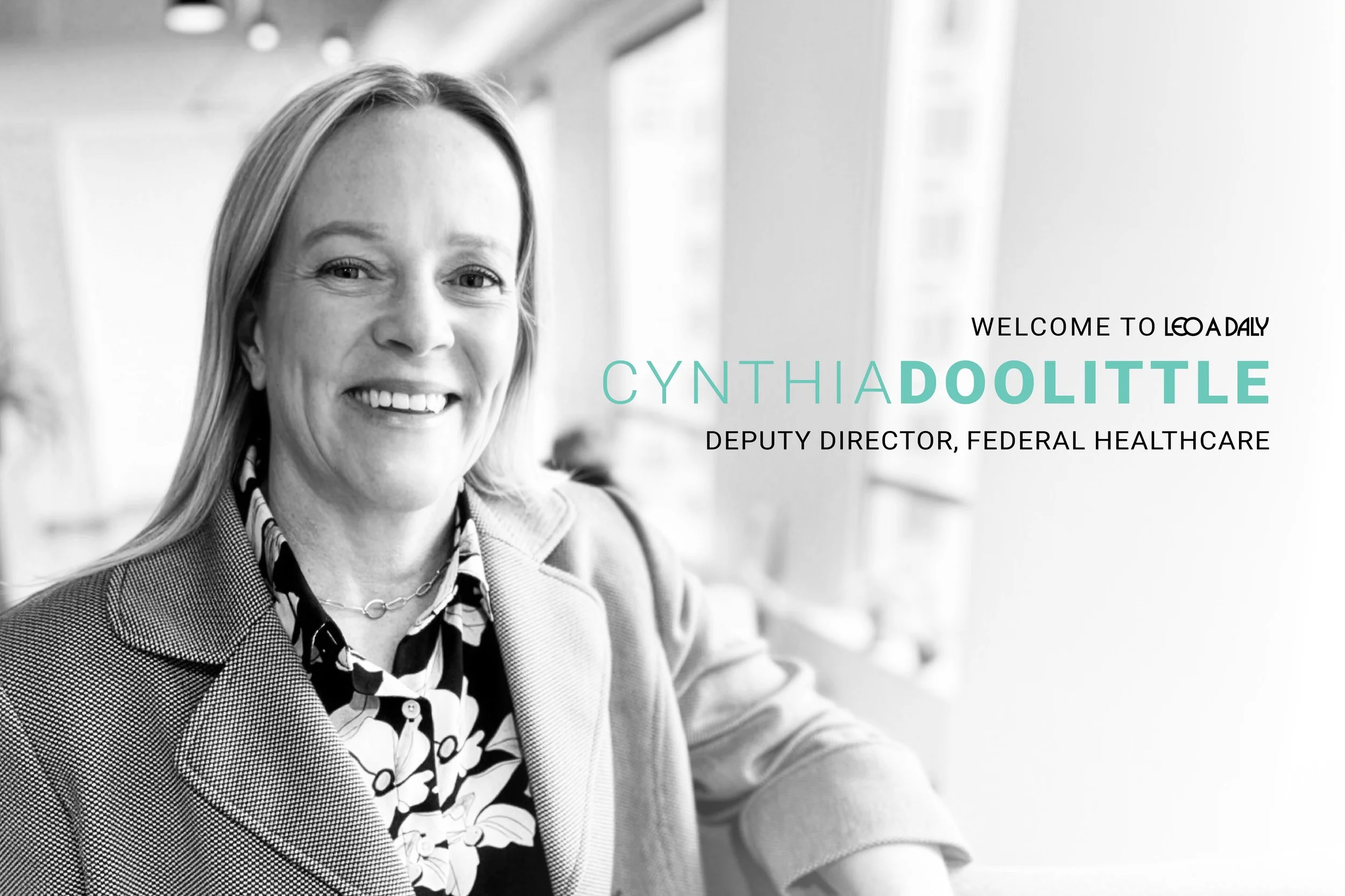 Welcome to LEO A DALY Cynthia Doolittle as Deputy Director, Federal Healthcare. Black & white headshot of Cyndi.