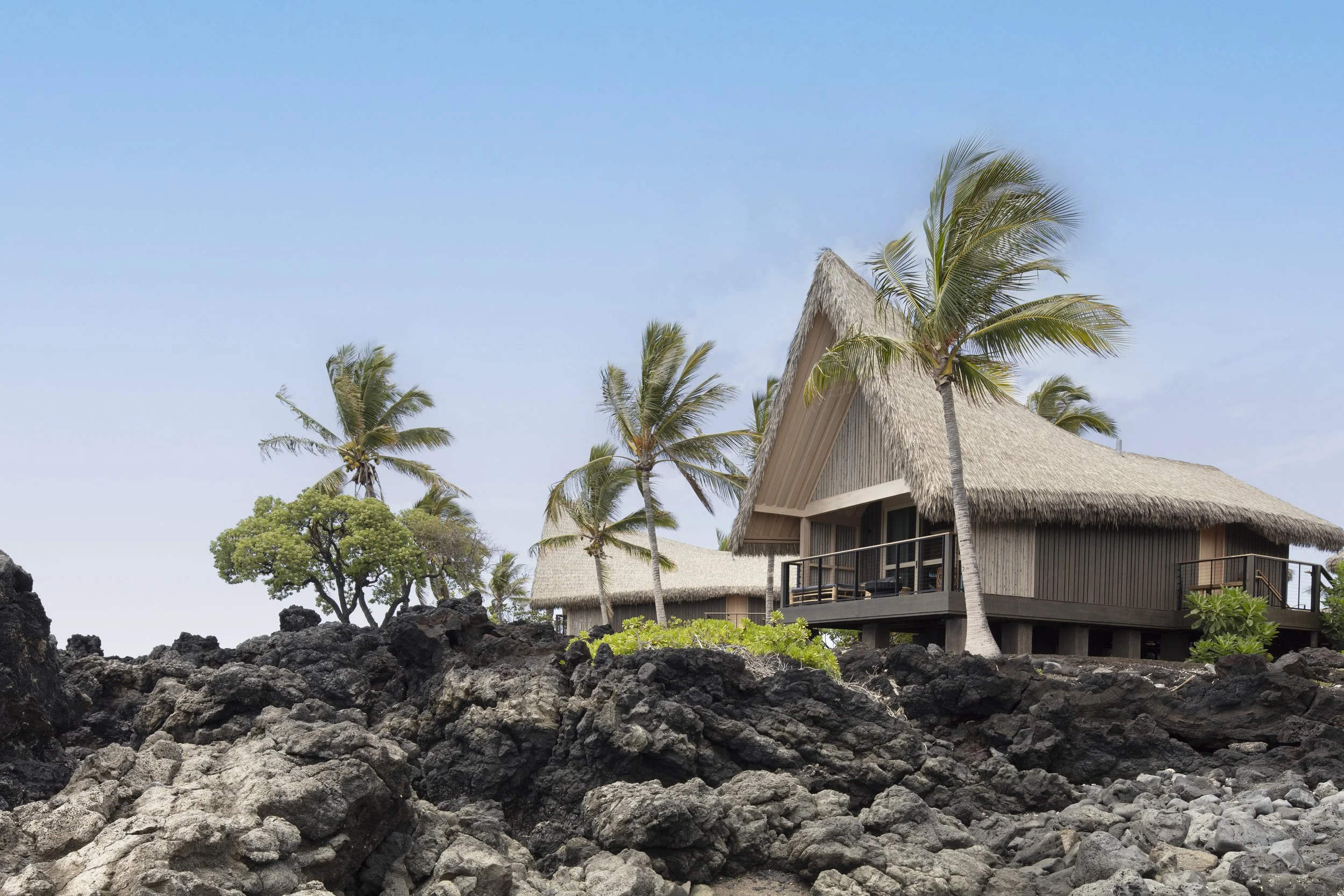 Kona Village Resort view of guest hale and volcanic terrain.