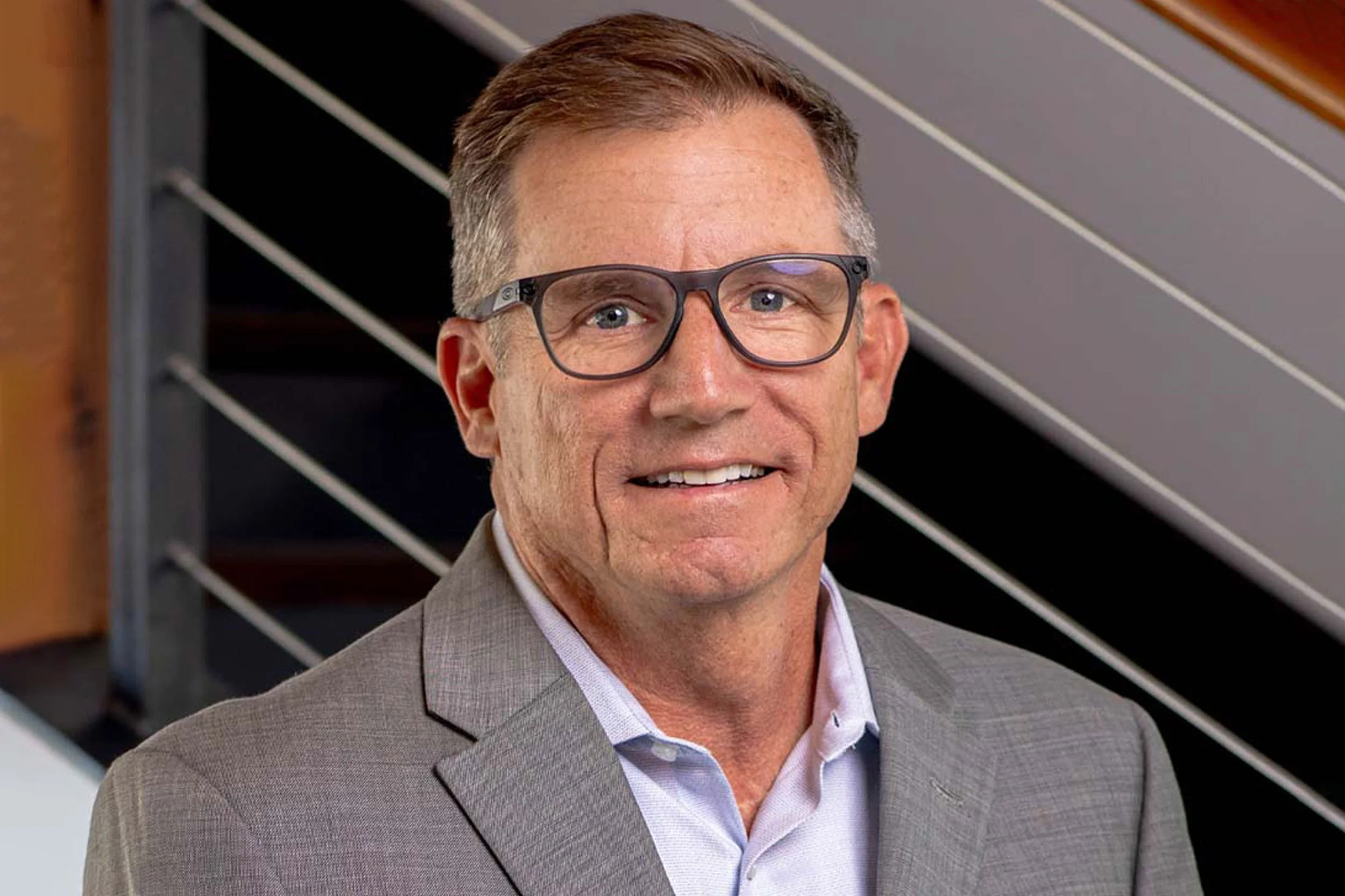 Mike Asaro in grey sport coat