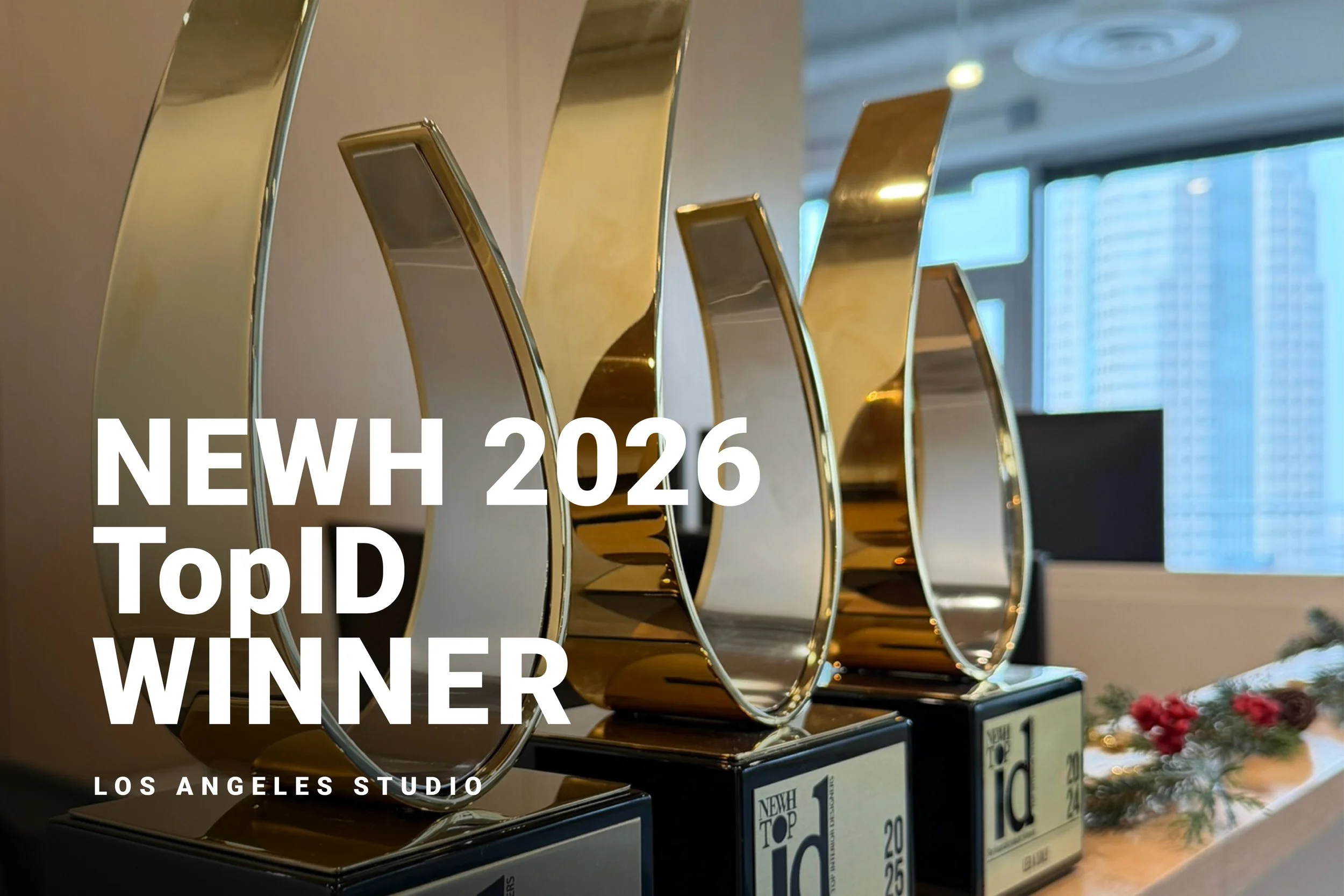 NEWH 2026 TopID Winner LEO A DALY Los Angeles Studio photo of consecutive three awards shown on display in office lobby.