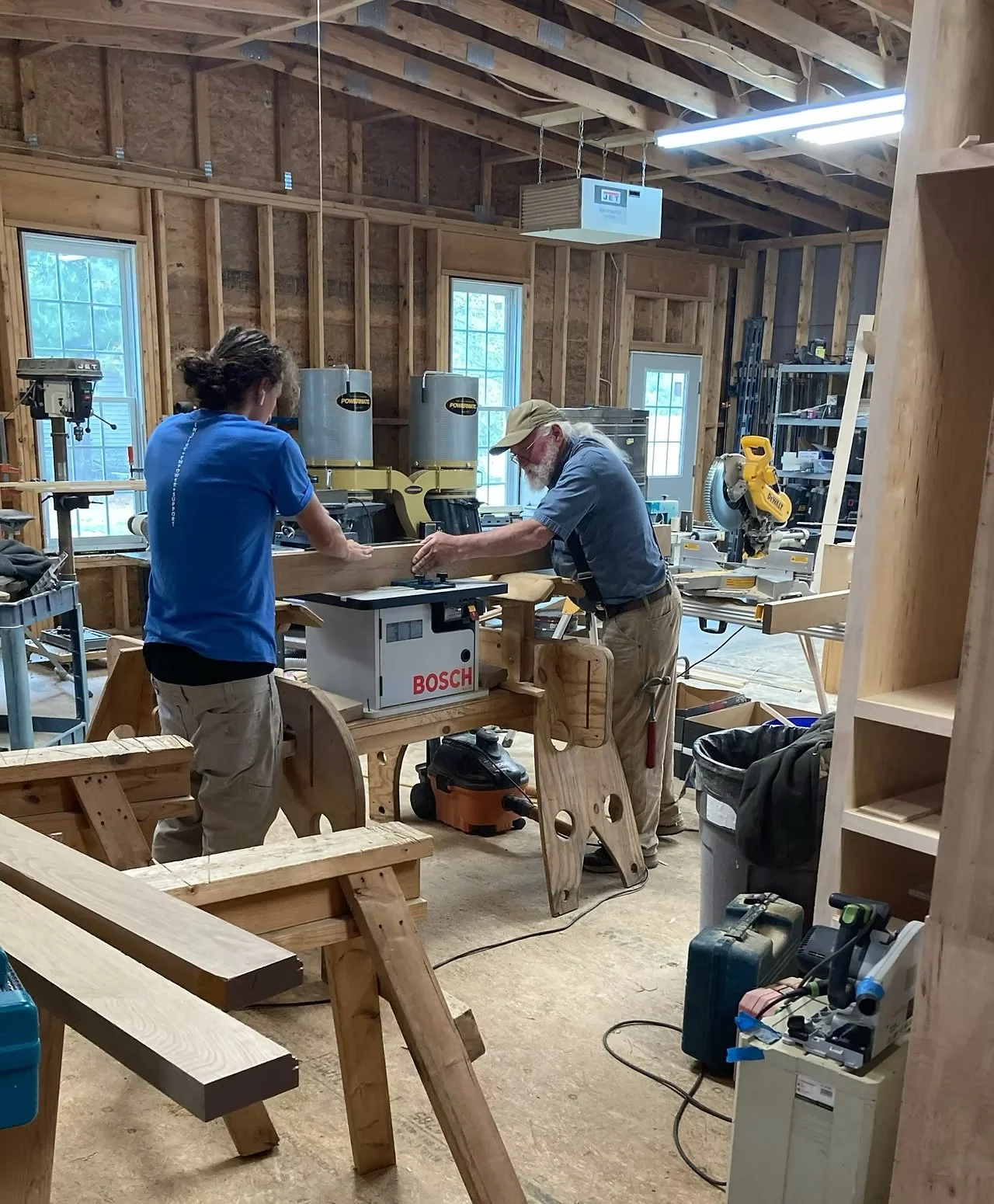 Carpenter using Bench Saw
