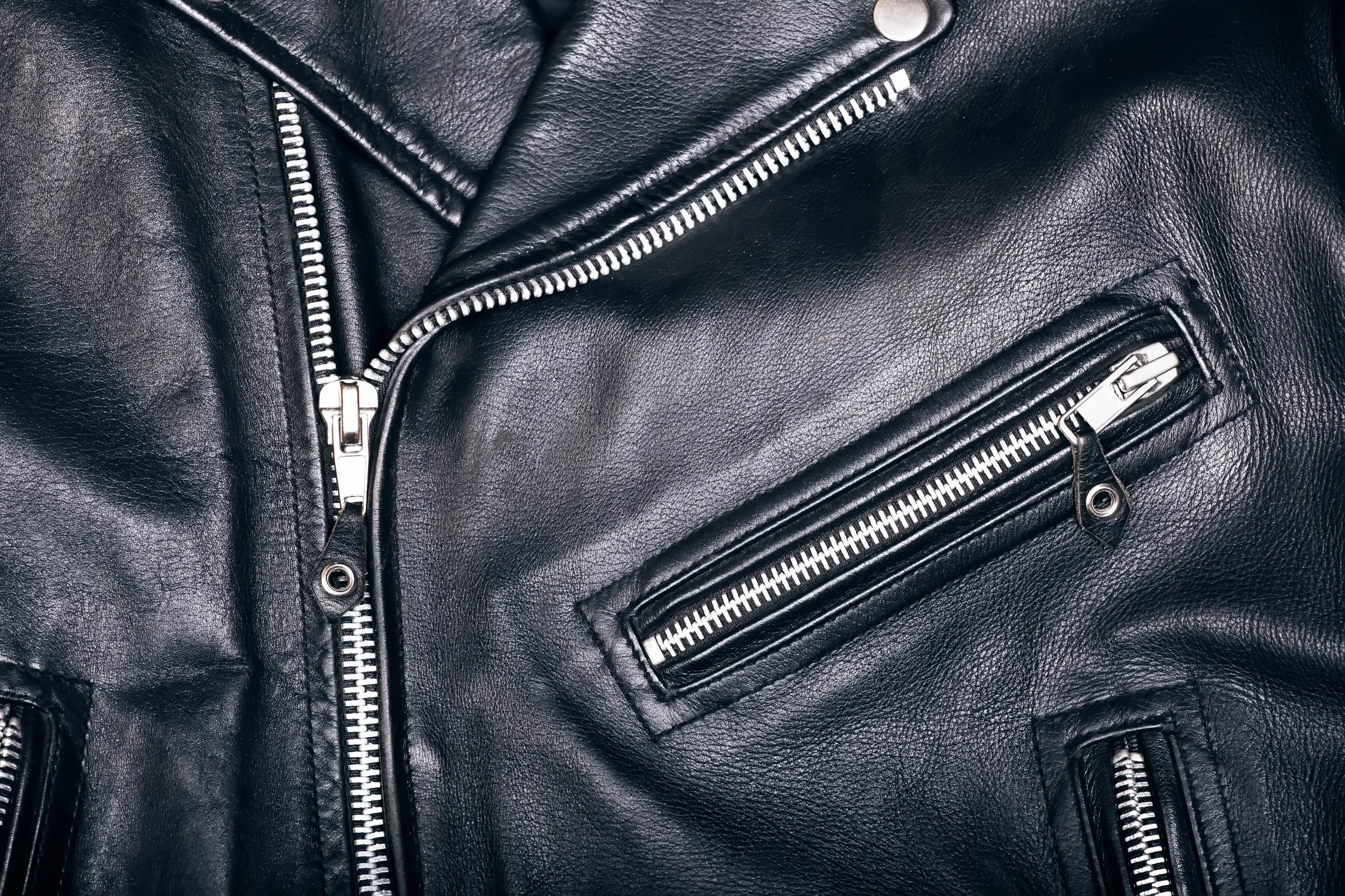 Black leather jacket zipper detail